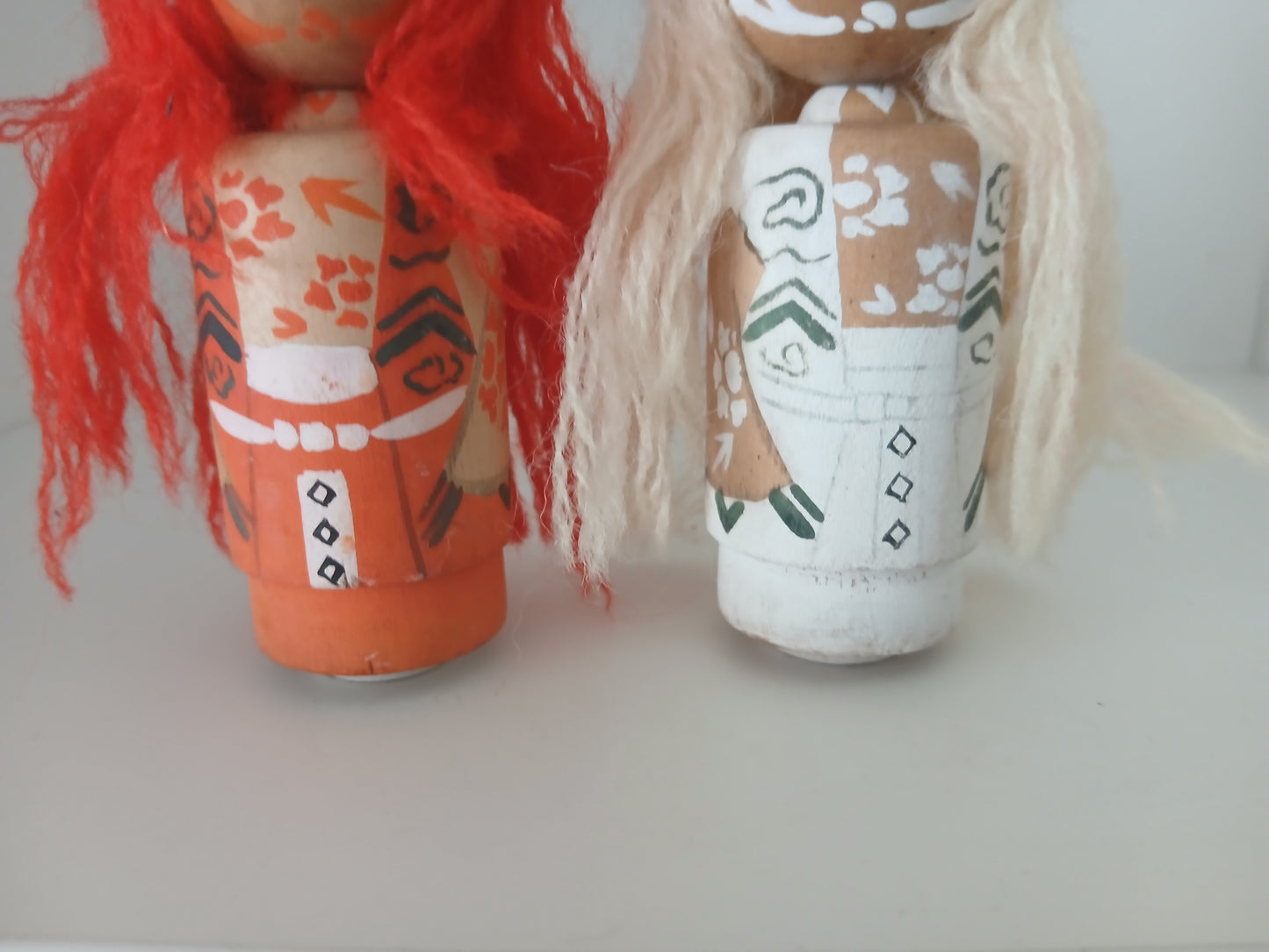 Two vintage kokeshi by Yuukari Kougei