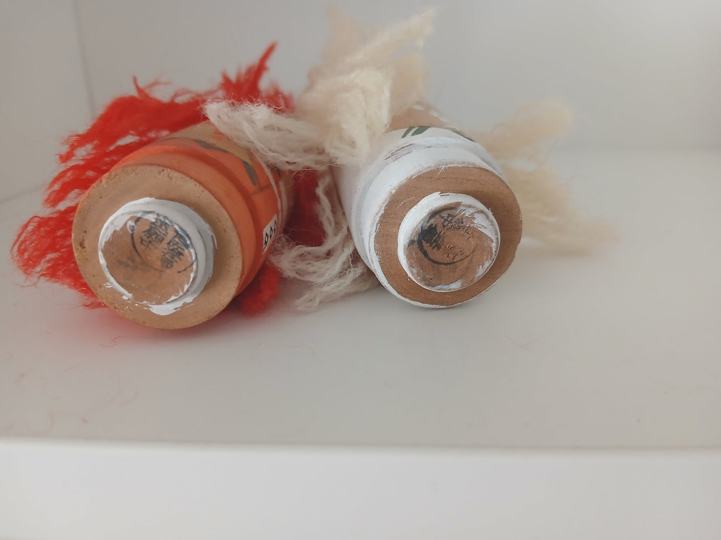 Two vintage kokeshi by Yuukari Kougei
