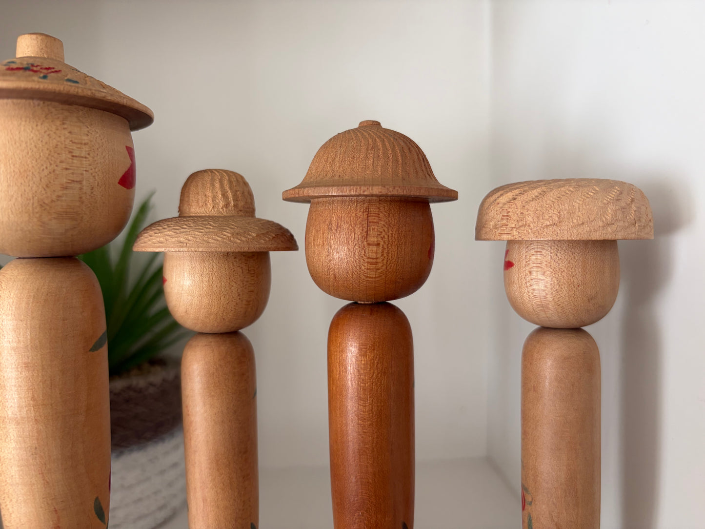 Vintage set of six Yamagata kokeshi with hat by Seijiro Kobayashi (1918-2015)