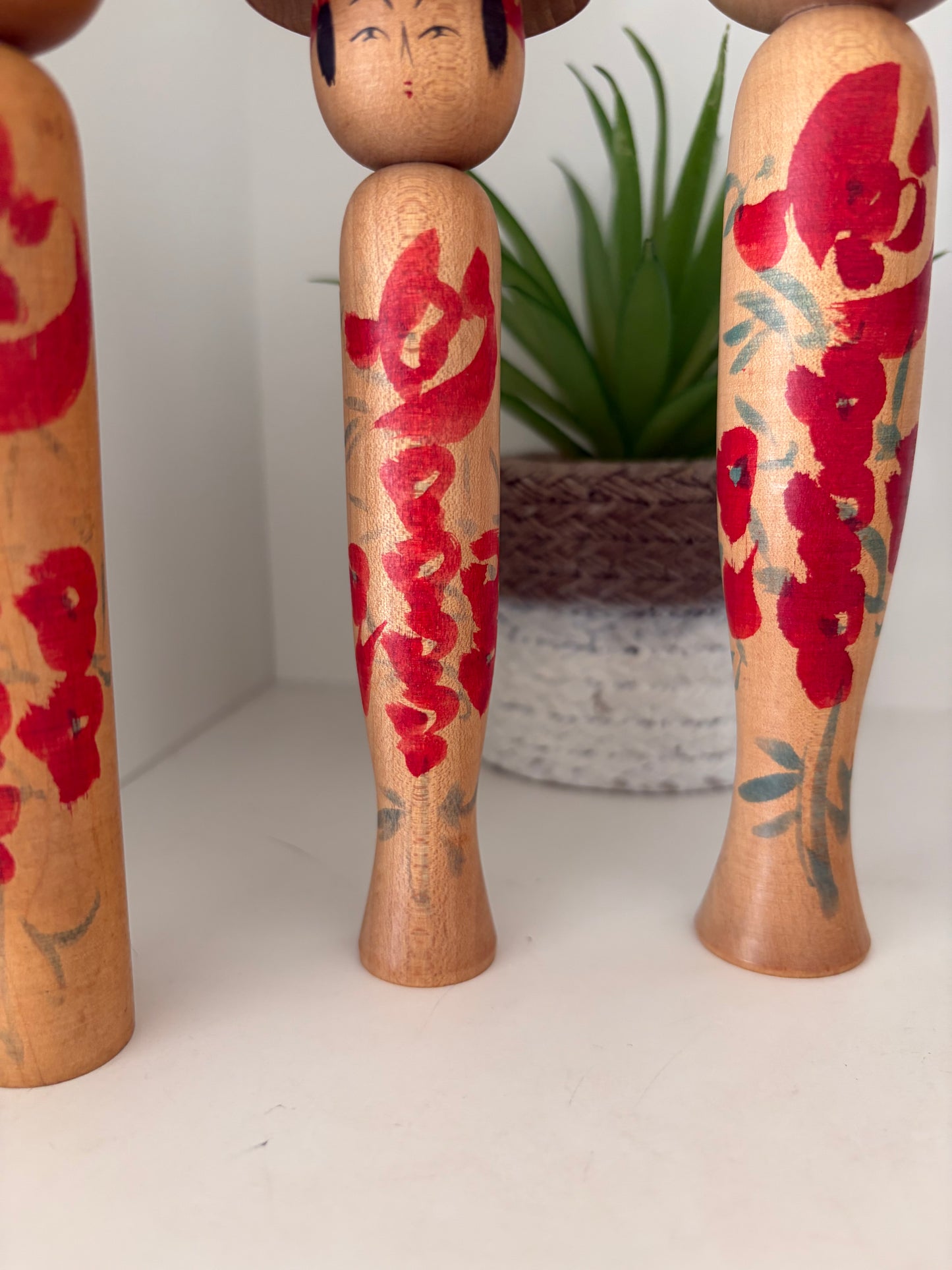 Vintage set of six Yamagata kokeshi with hat by Seijiro Kobayashi (1918-2015)