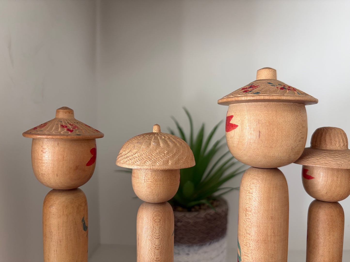 Vintage set of six Yamagata kokeshi with hat by Seijiro Kobayashi (1918-2015)