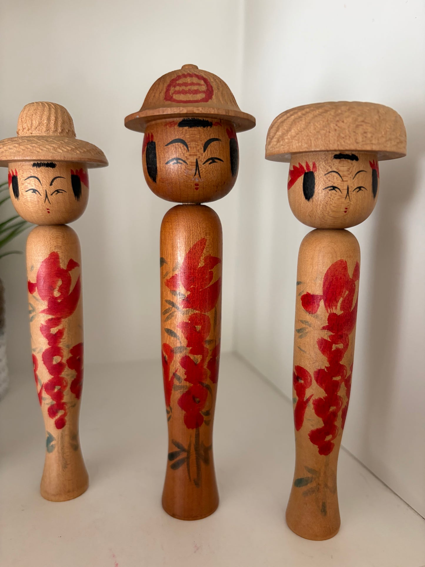 Vintage set of six Yamagata kokeshi with hat by Seijiro Kobayashi (1918-2015)