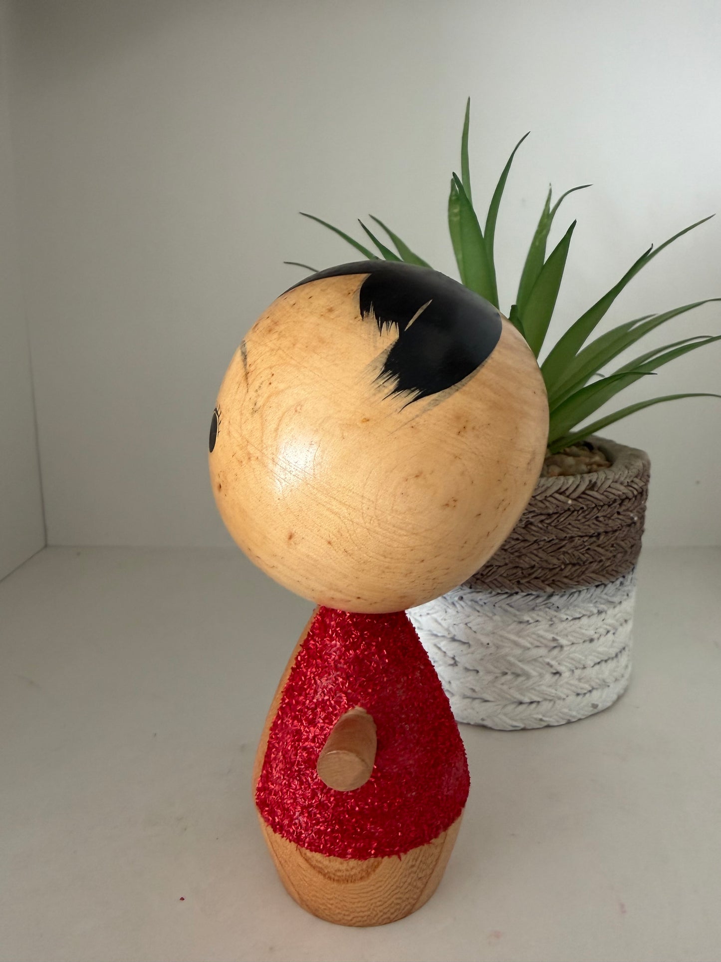 Cute sosaku kokeshi with red glitter jacket