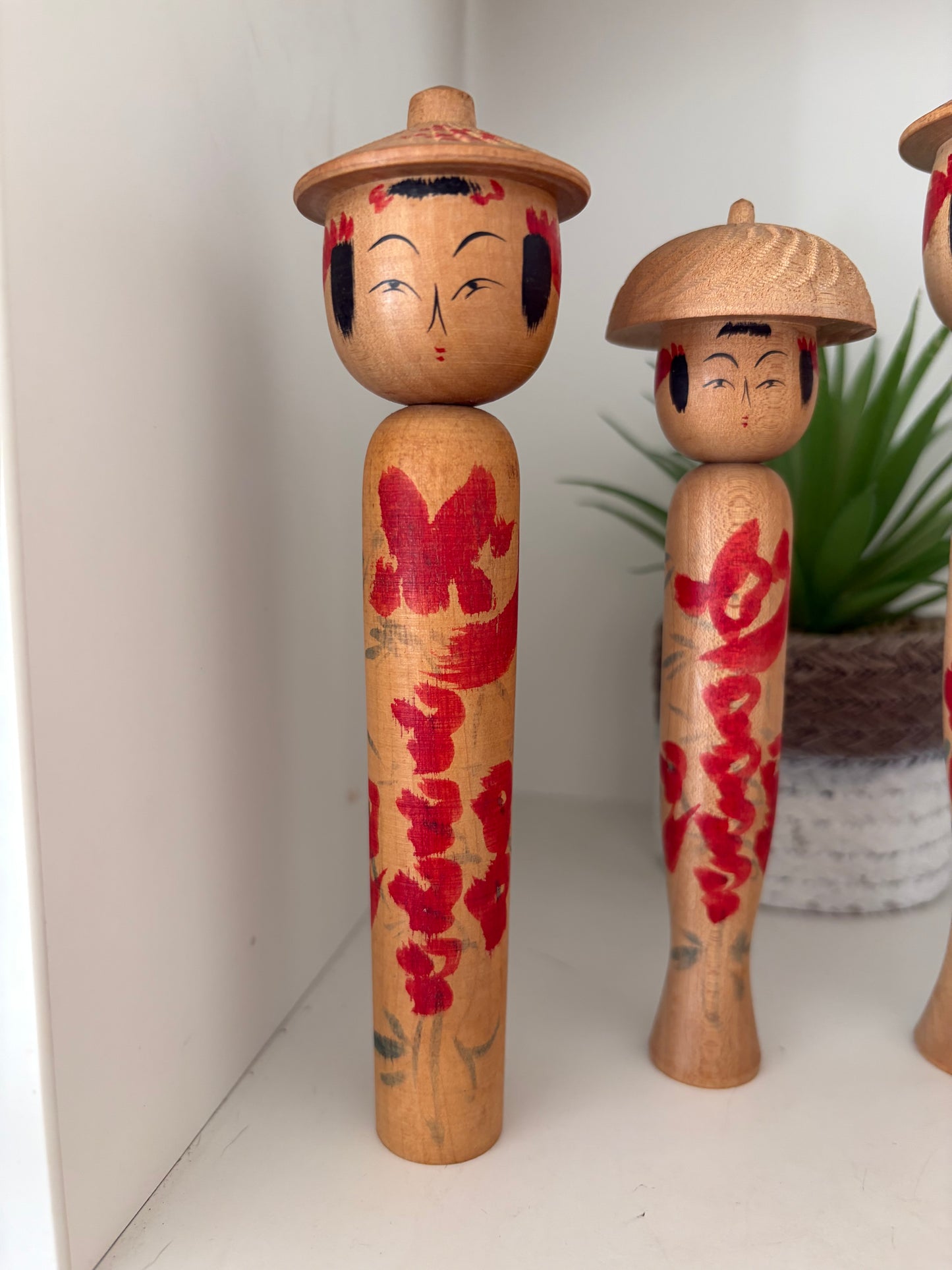 Vintage set of six Yamagata kokeshi with hat by Seijiro Kobayashi (1918-2015)