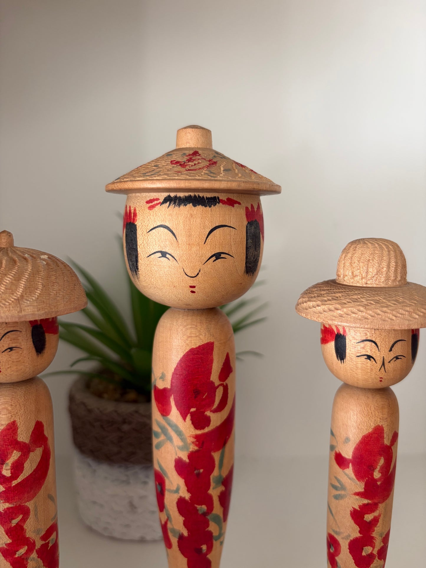 Vintage set of six Yamagata kokeshi with hat by Seijiro Kobayashi (1918-2015)