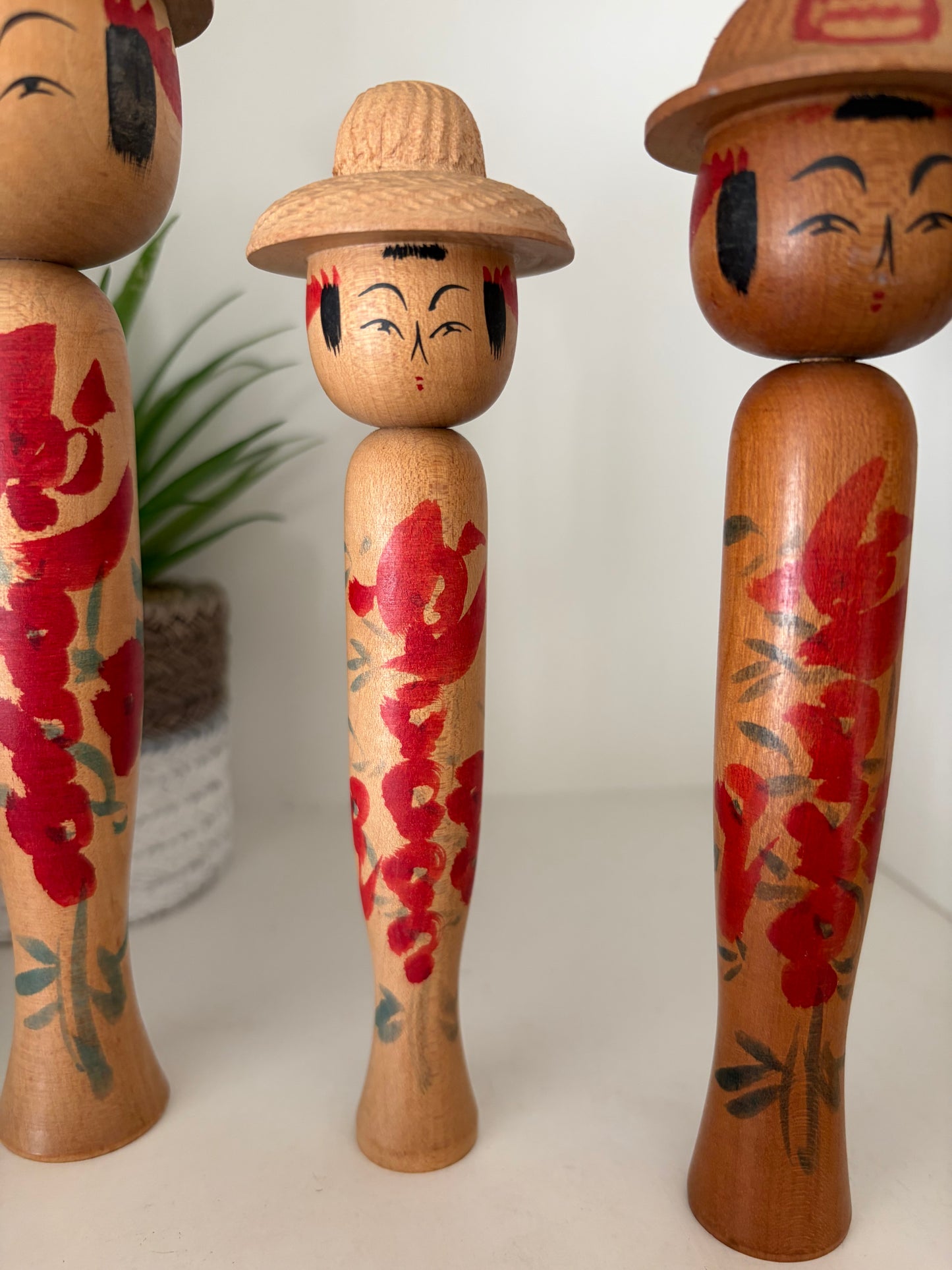 Vintage set of six Yamagata kokeshi with hat by Seijiro Kobayashi (1918-2015)