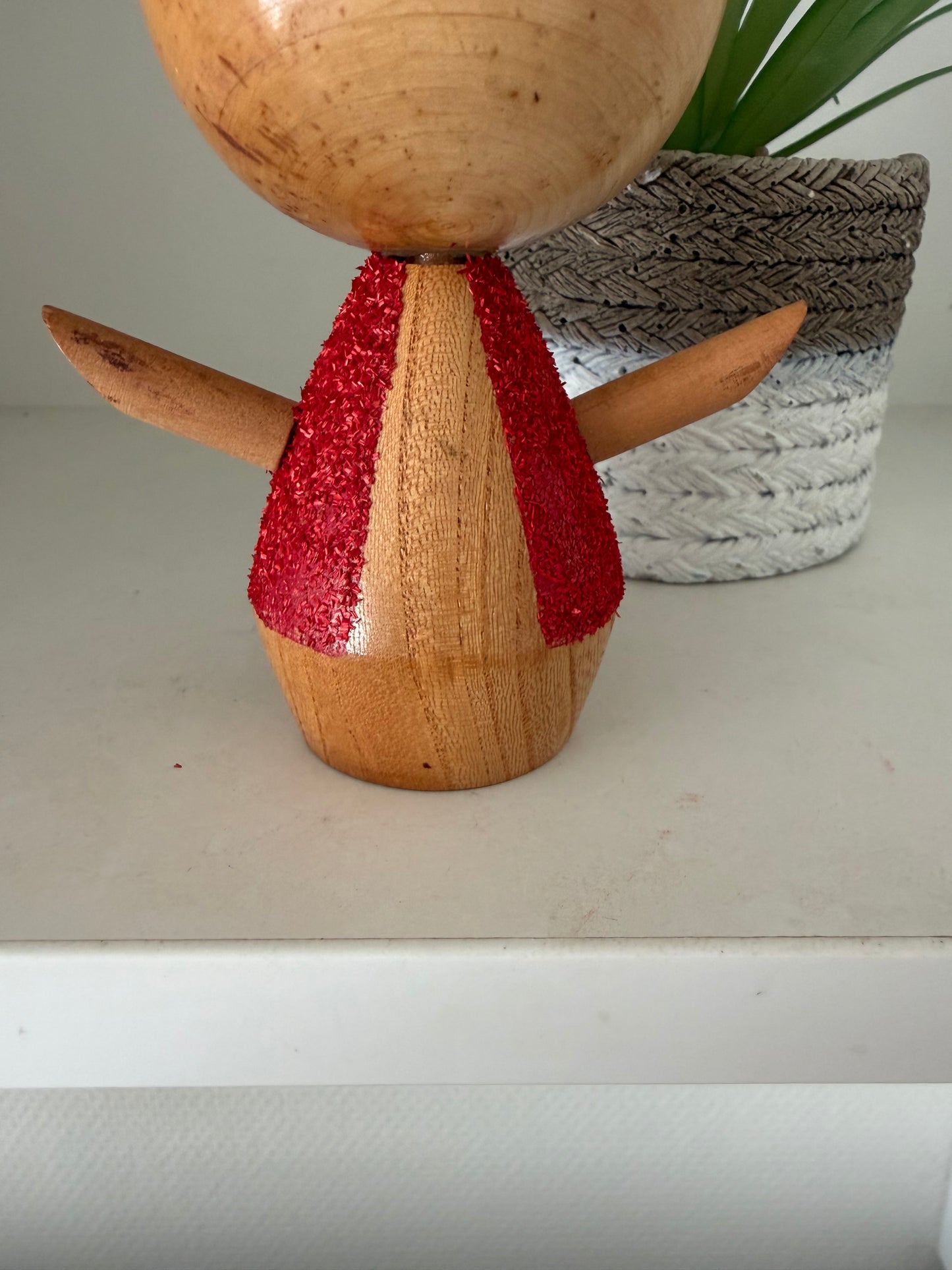 Cute sosaku kokeshi with red glitter jacket