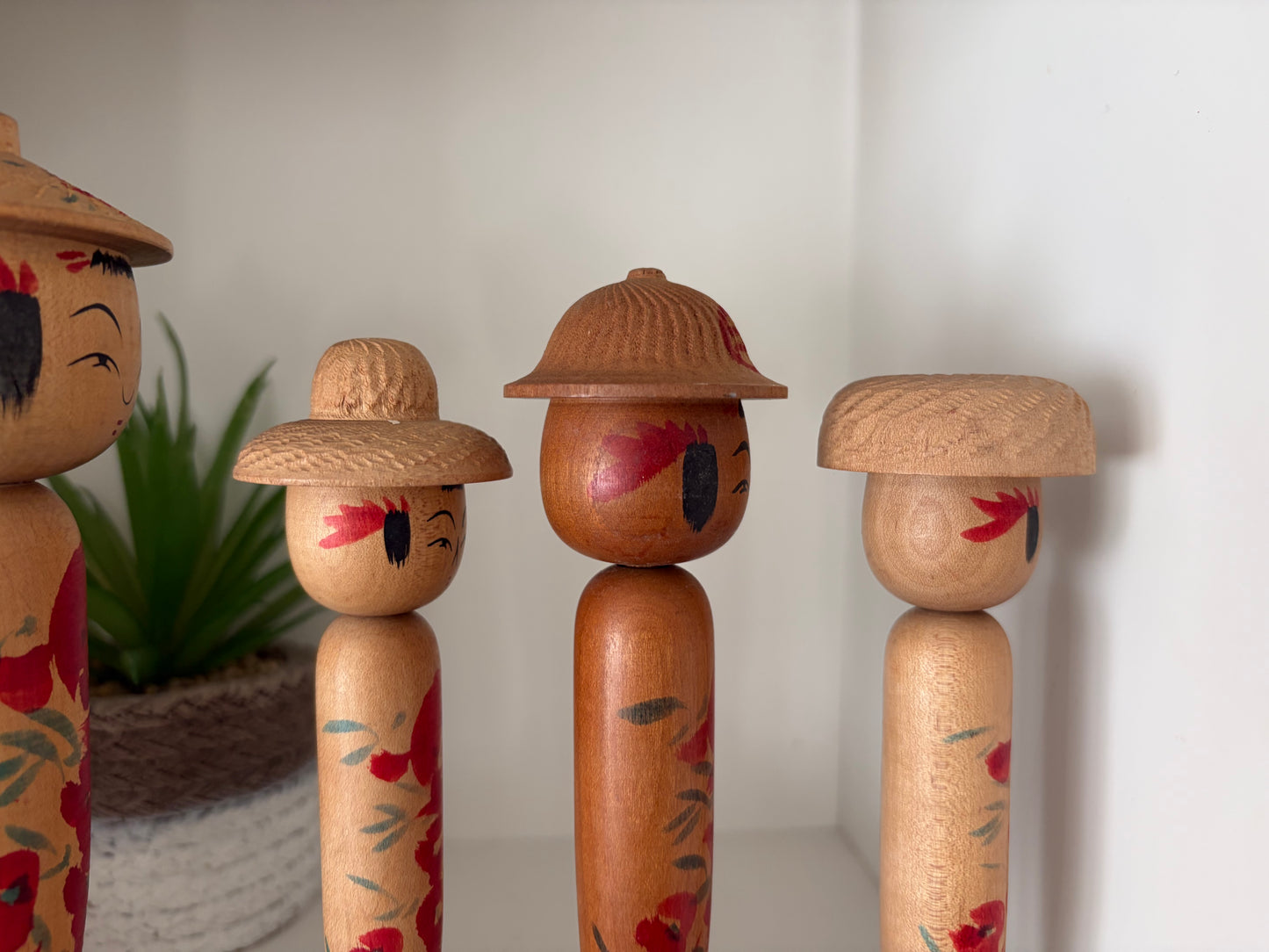 Vintage set of six Yamagata kokeshi with hat by Seijiro Kobayashi (1918-2015)