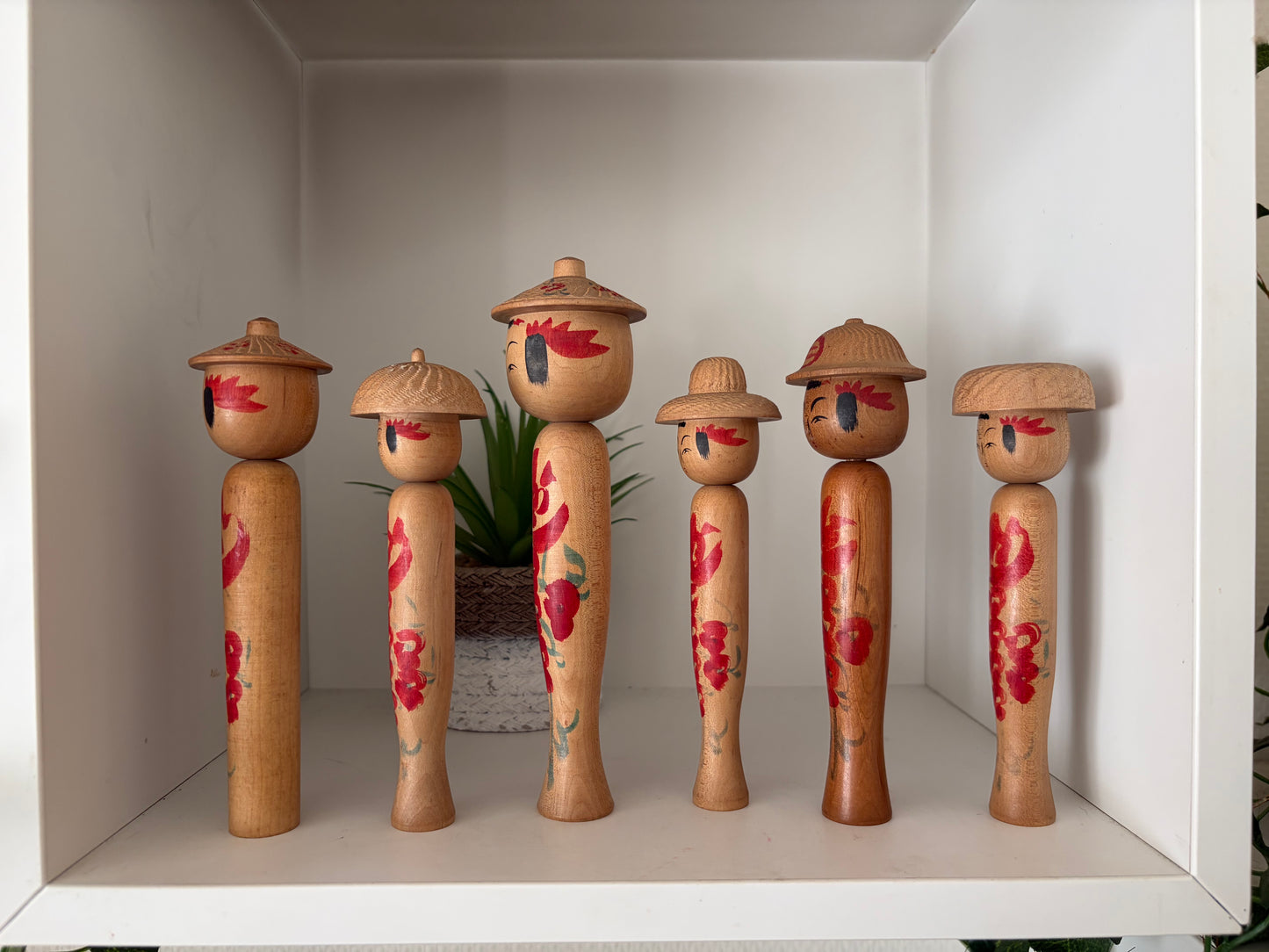 Vintage set of six Yamagata kokeshi with hat by Seijiro Kobayashi (1918-2015)