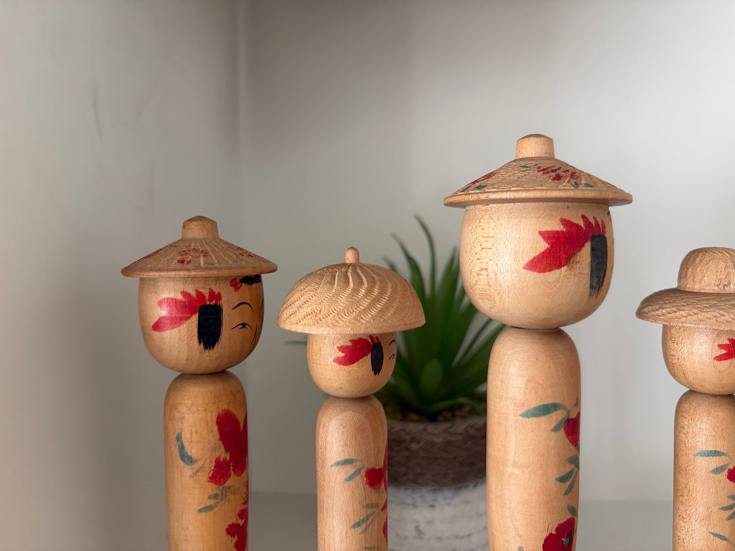 Vintage set of six Yamagata kokeshi with hat by Seijiro Kobayashi (1918-2015)