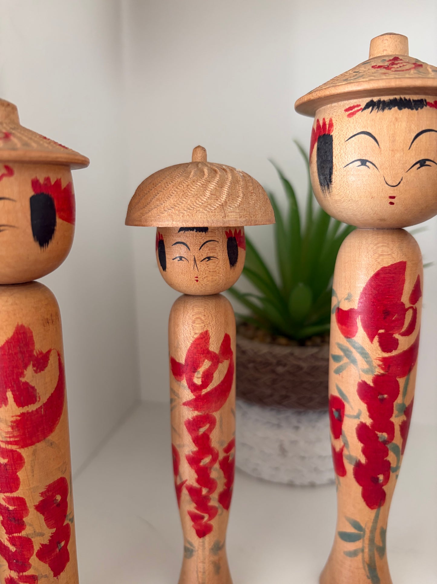 Vintage set of six Yamagata kokeshi with hat by Seijiro Kobayashi (1918-2015)