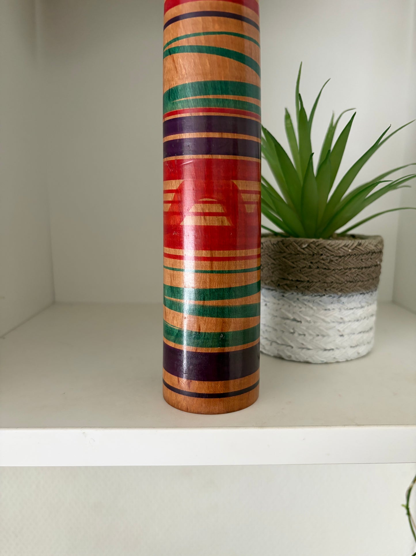 Vintage traditional Tsuchiyu kokeshi with striped design