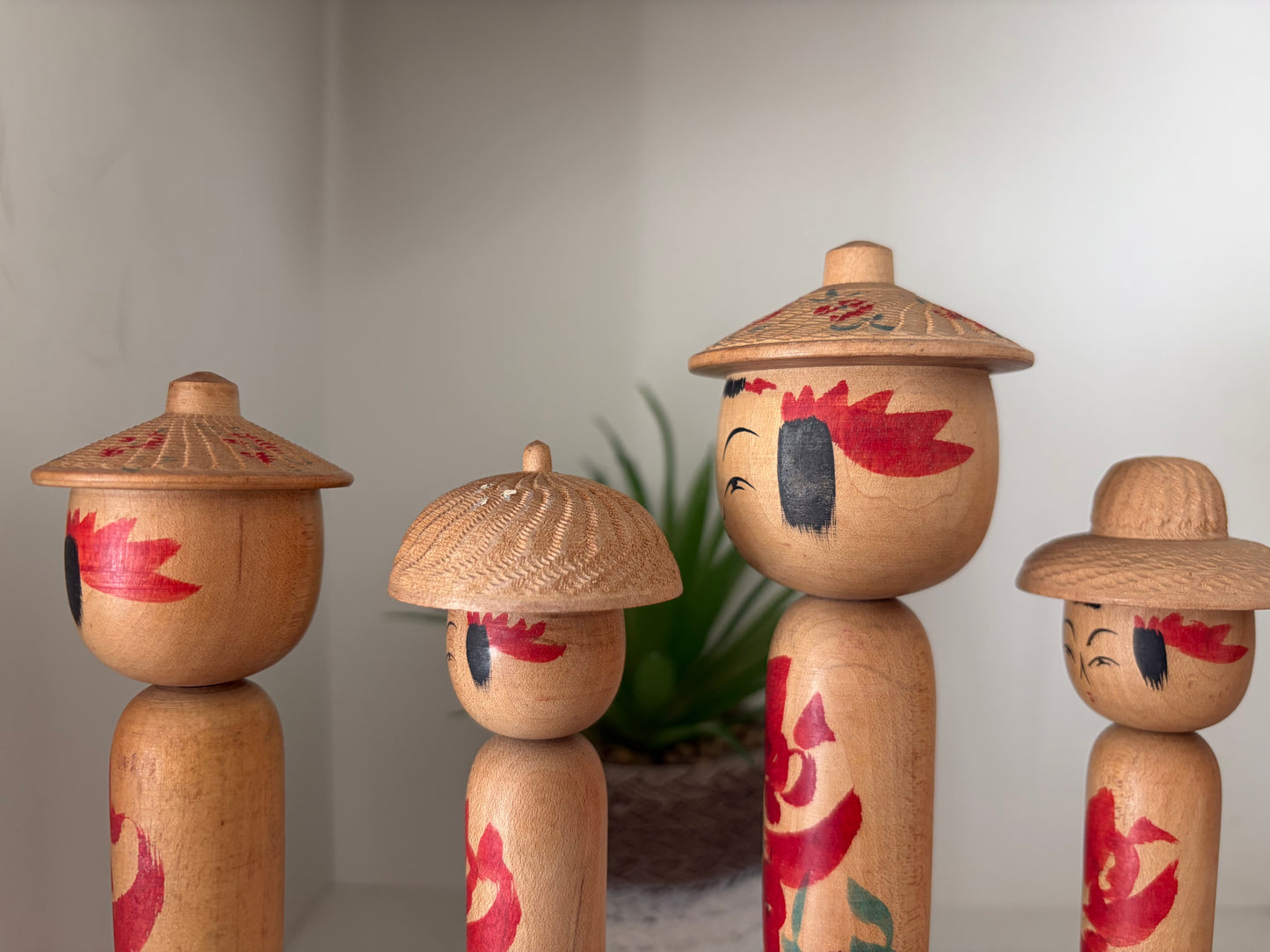 Vintage set of six Yamagata kokeshi with hat by Seijiro Kobayashi (1918-2015)