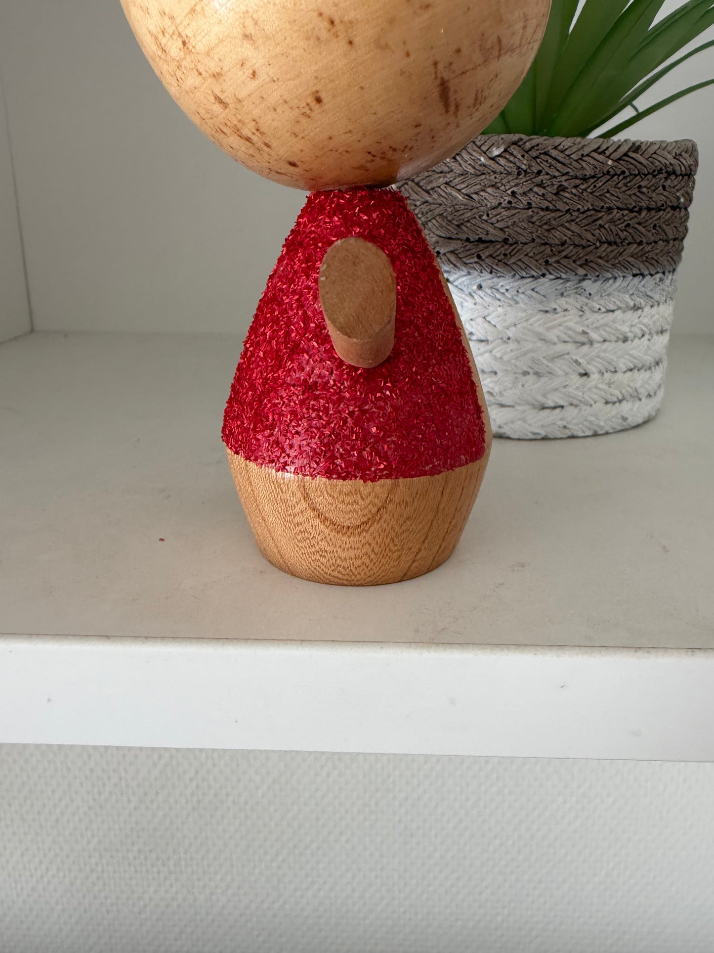 Cute sosaku kokeshi with red glitter jacket
