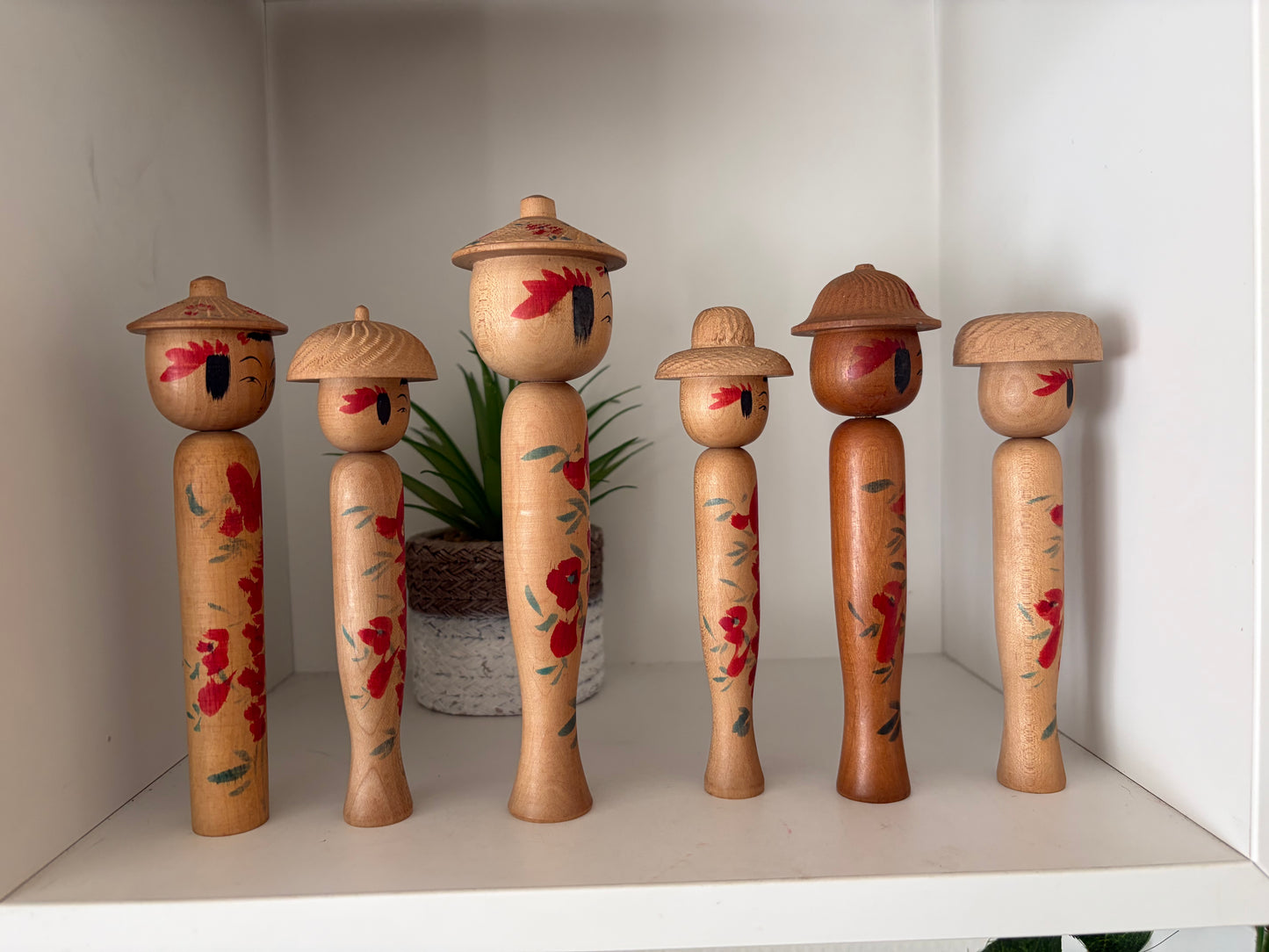 Vintage set of six Yamagata kokeshi with hat by Seijiro Kobayashi (1918-2015)