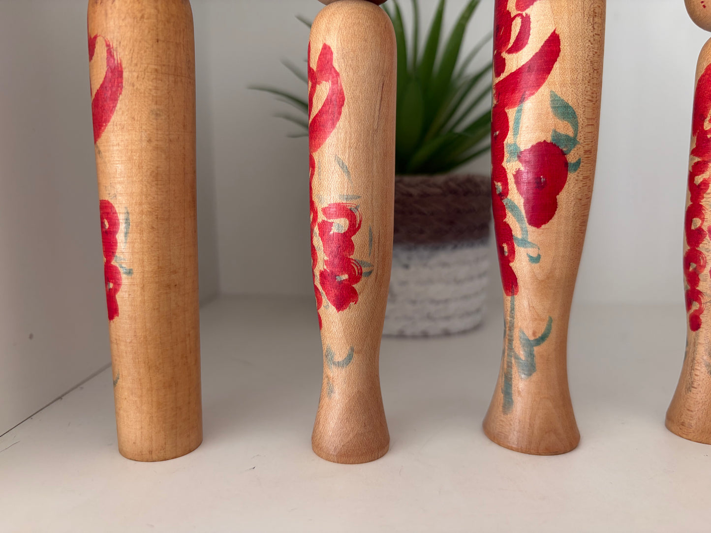 Vintage set of six Yamagata kokeshi with hat by Seijiro Kobayashi (1918-2015)