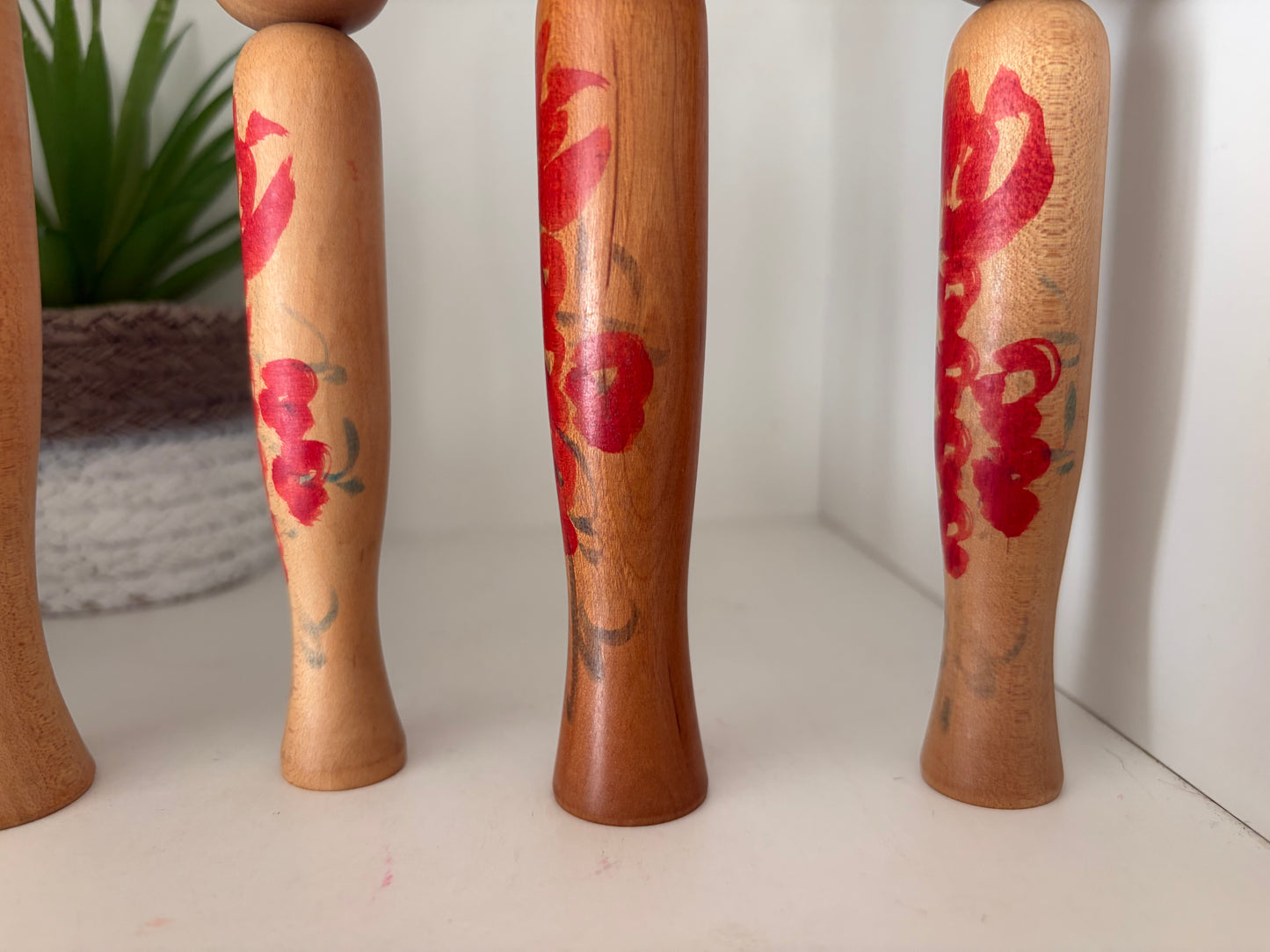 Vintage set of six Yamagata kokeshi with hat by Seijiro Kobayashi (1918-2015)