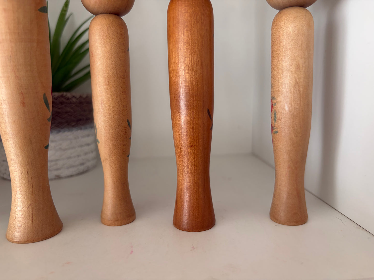 Vintage set of six Yamagata kokeshi with hat by Seijiro Kobayashi (1918-2015)