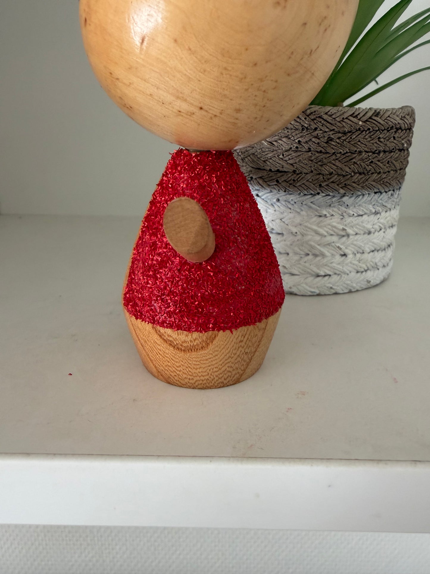 Cute sosaku kokeshi with red glitter jacket