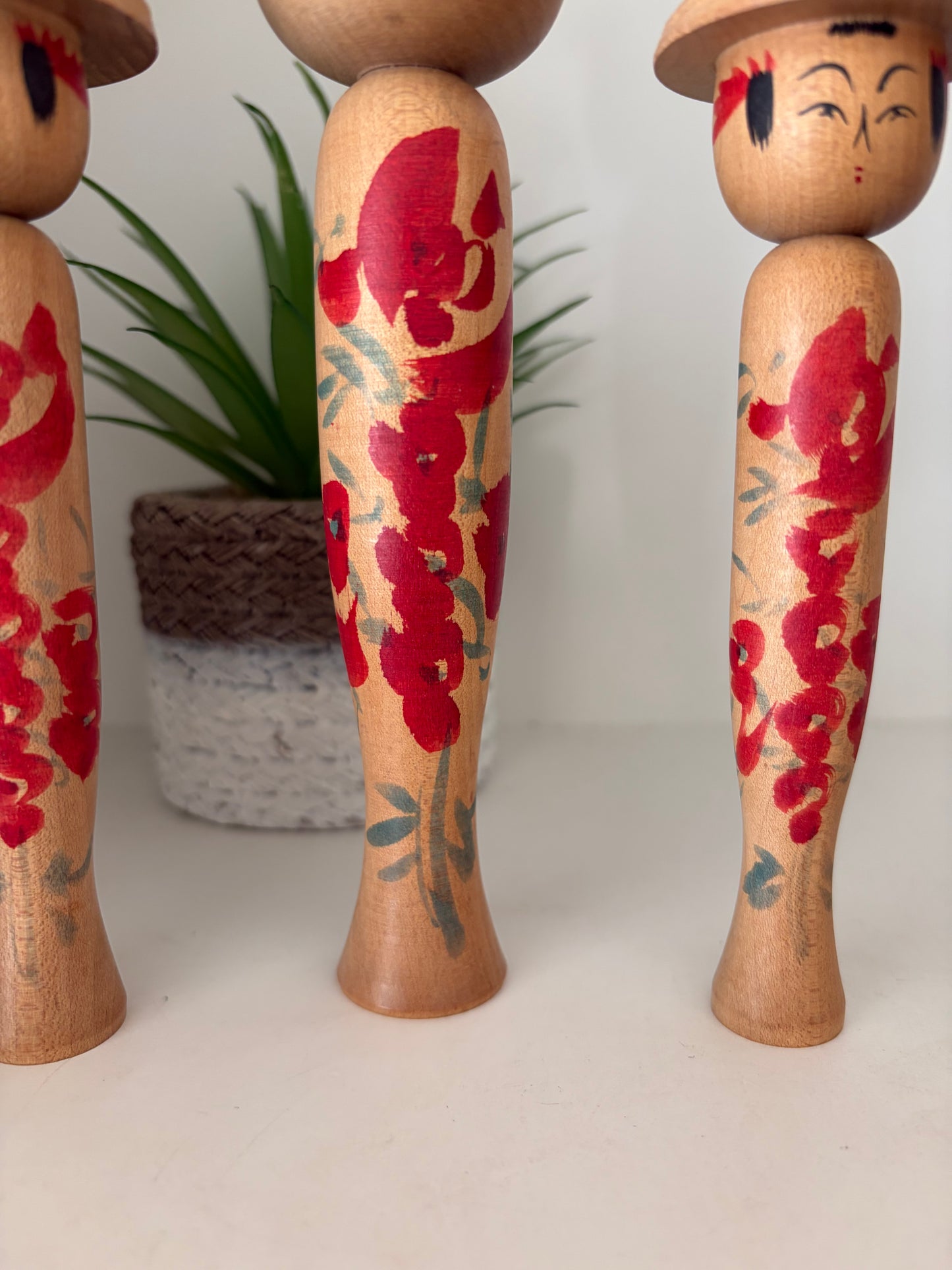 Vintage set of six Yamagata kokeshi with hat by Seijiro Kobayashi (1918-2015)
