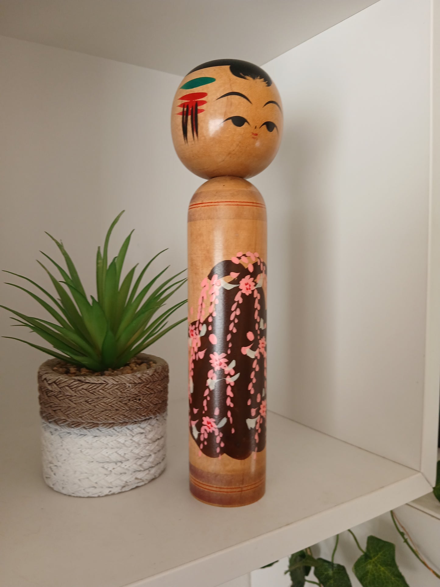 Vintage Shingata kokeshi with Wisteria design