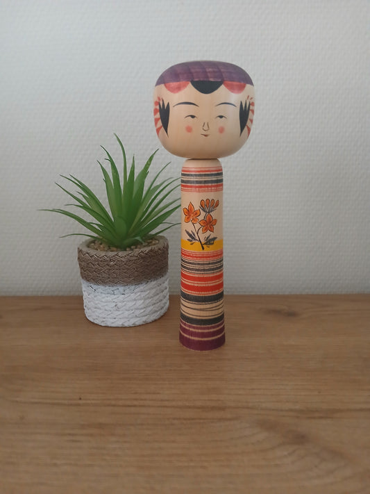 Traditional Yajiro kokeshi by Hideyeku Sato
