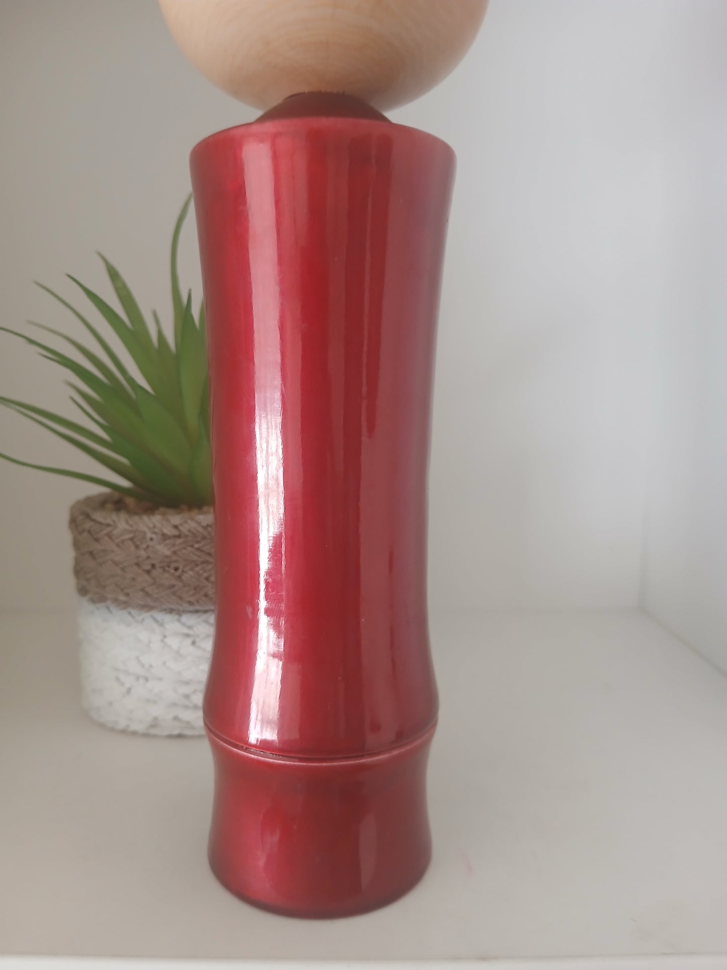 Lovely vintage red lacquer kokeshi by Takahashi Tatsuro