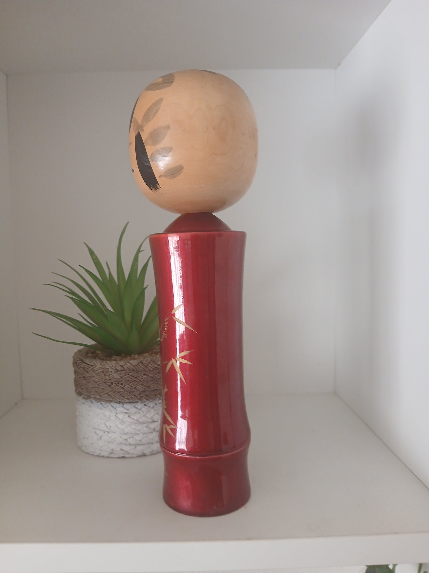 Lovely vintage red lacquer kokeshi by Takahashi Tatsuro