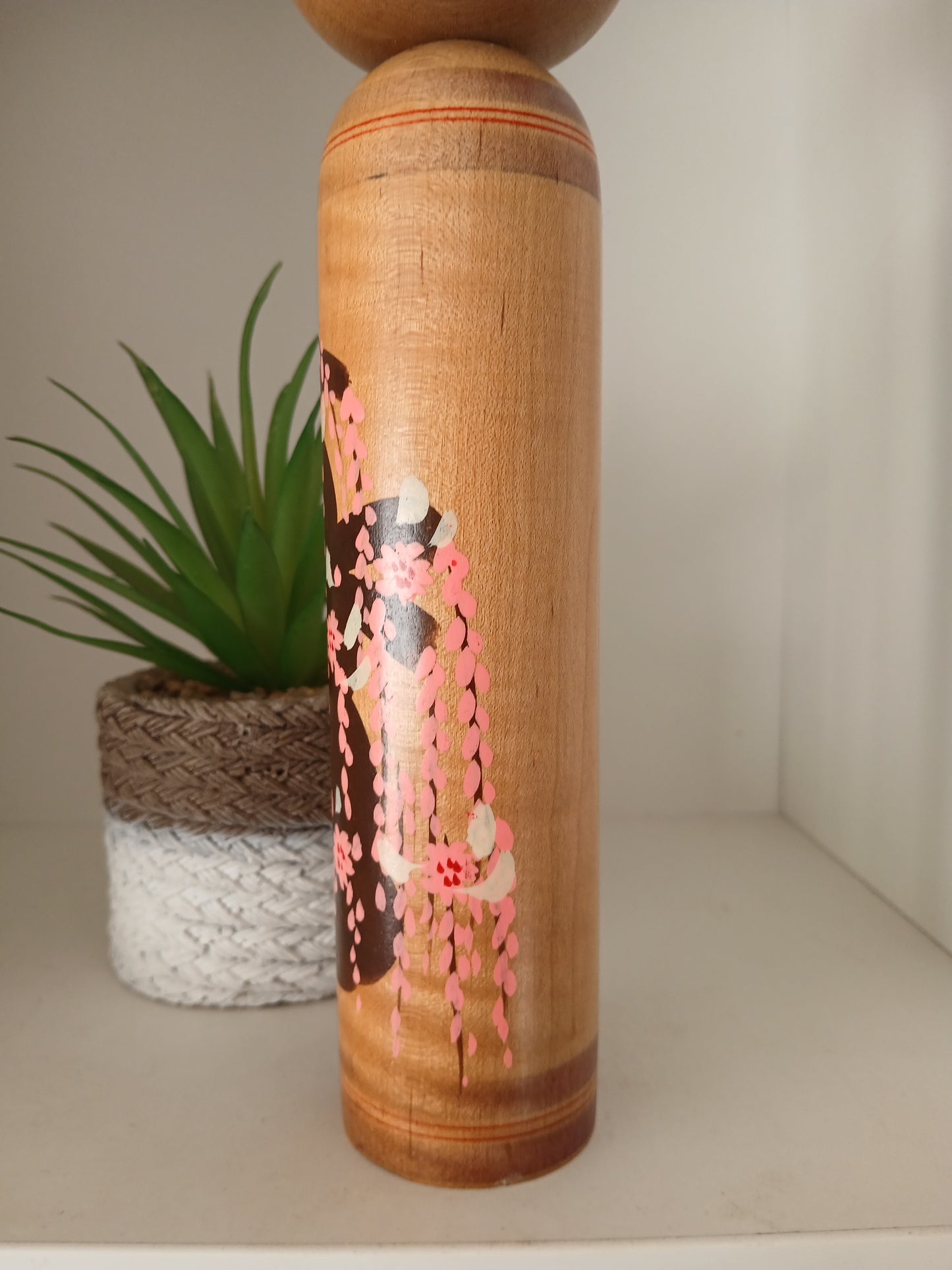 Vintage Shingata kokeshi with Wisteria design