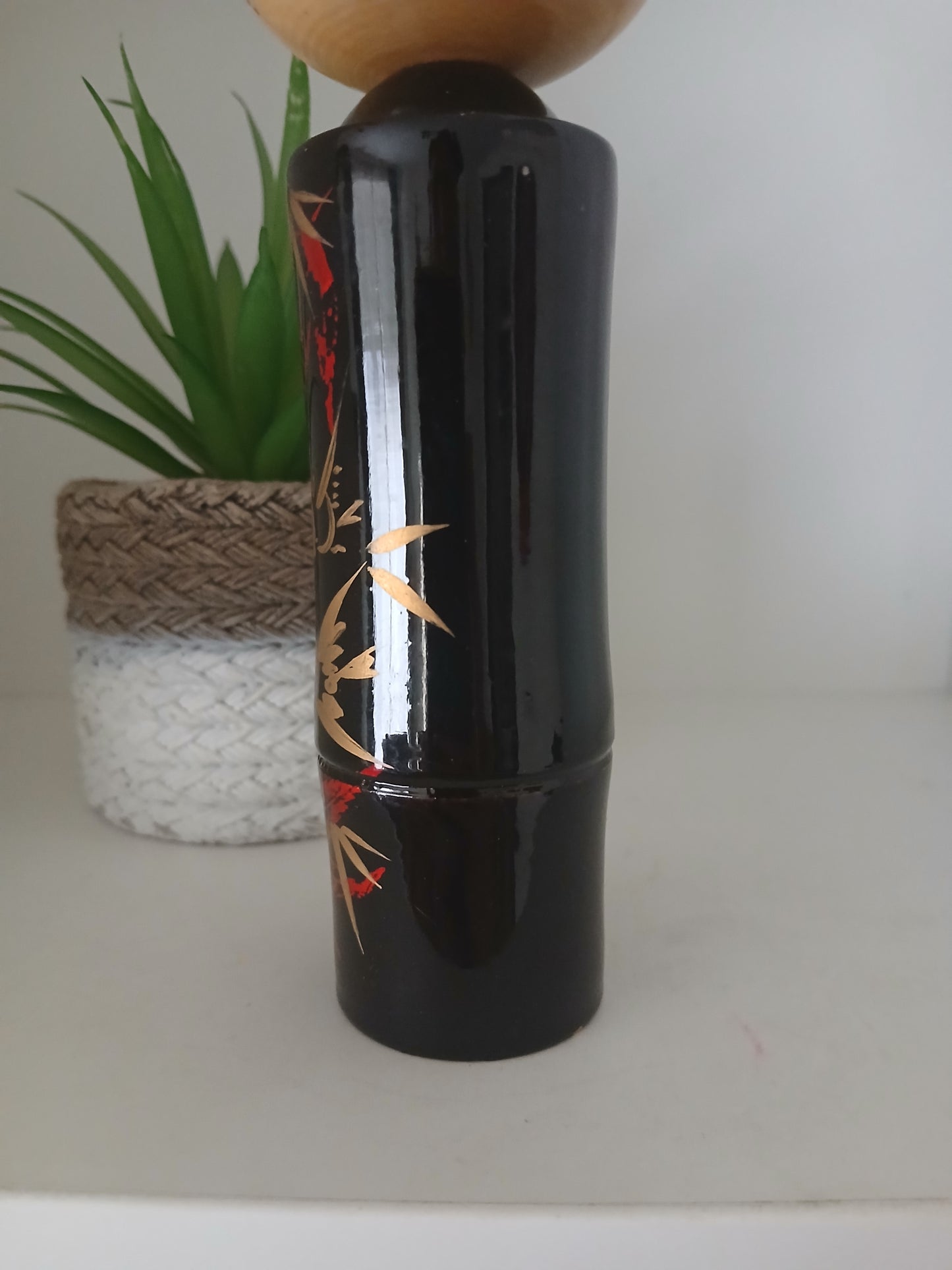 Lovely vintage black lacquer kokeshi by Takahashi Tatsuro