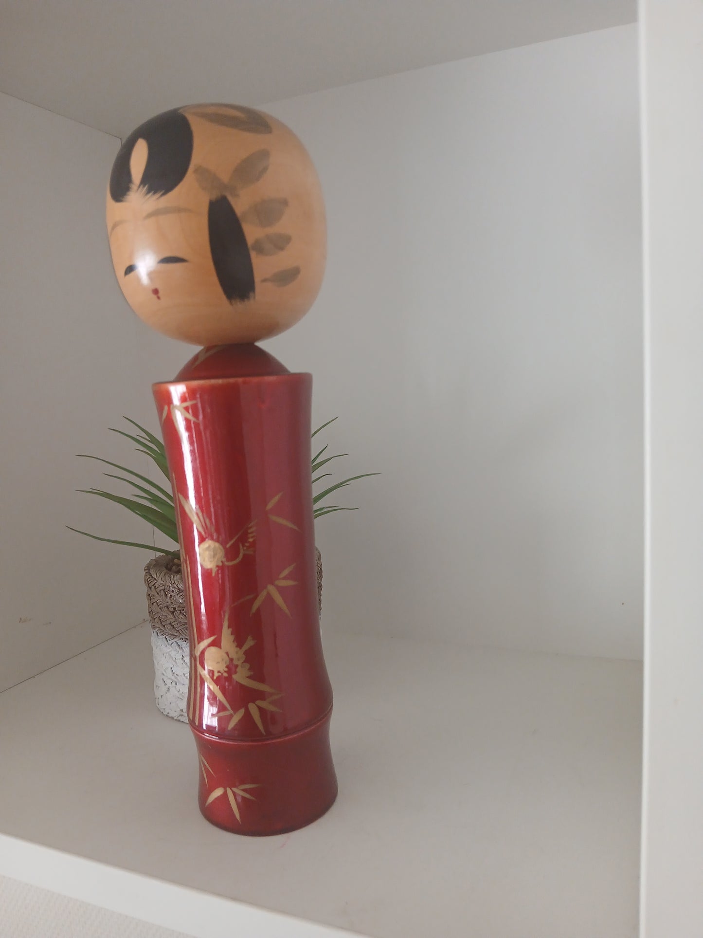 Lovely vintage red lacquer kokeshi by Takahashi Tatsuro