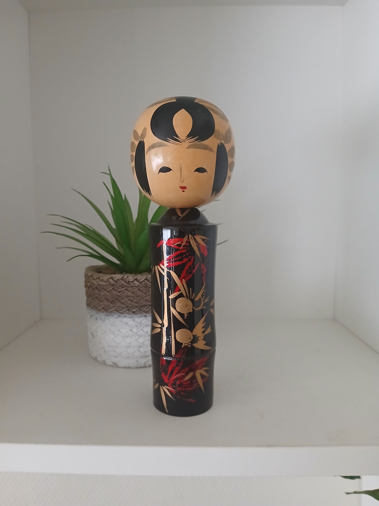 Lovely vintage black lacquer kokeshi by Takahashi Tatsuro