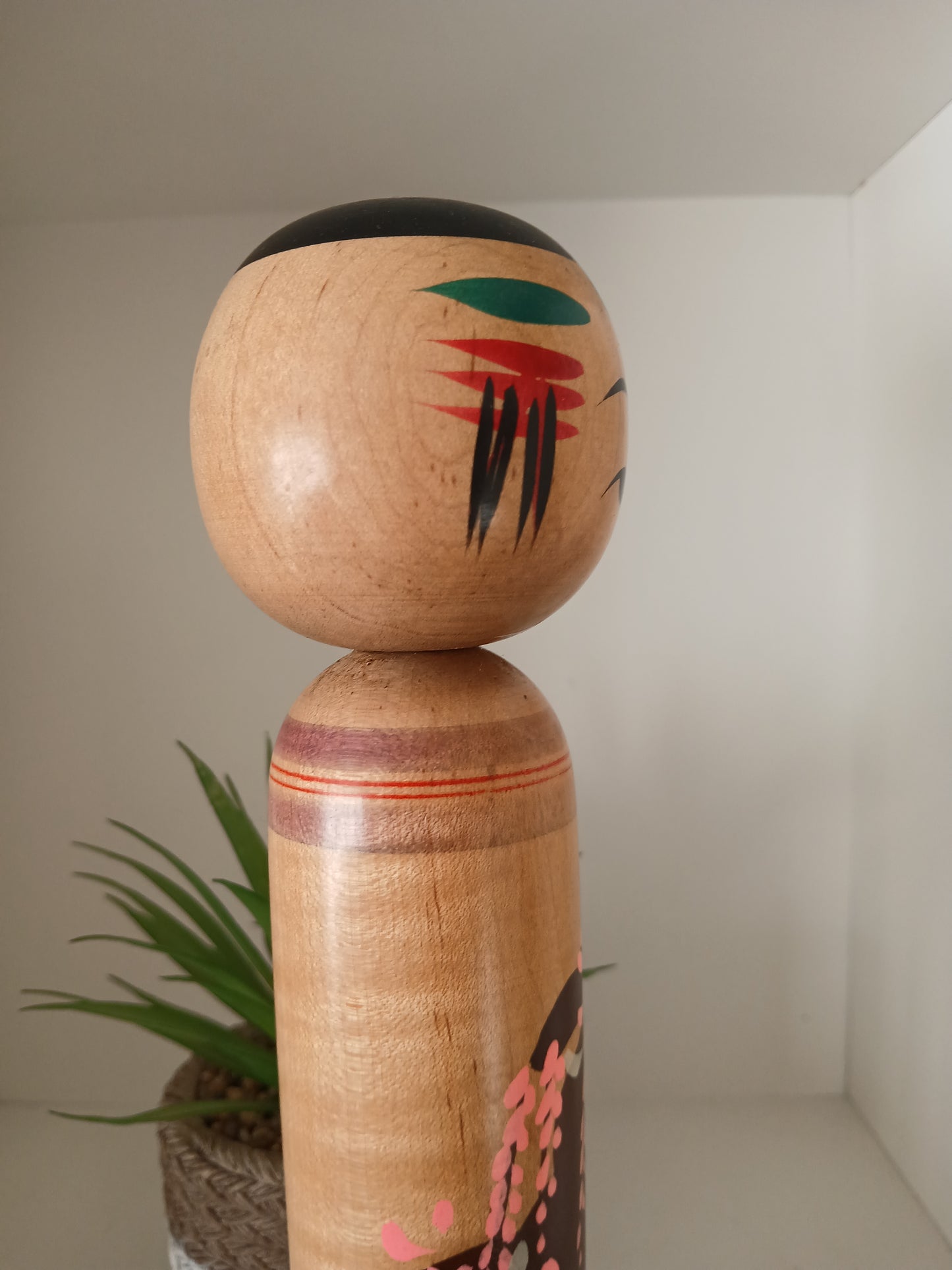 Vintage Shingata kokeshi with Wisteria design