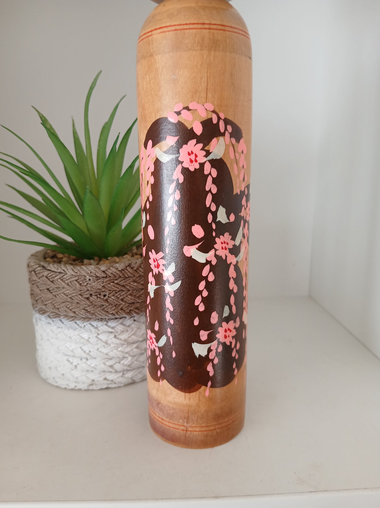 Vintage Shingata kokeshi with Wisteria design