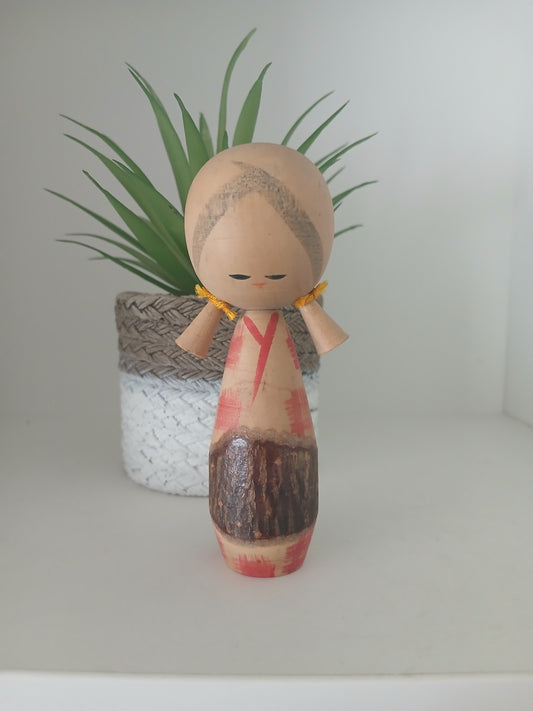Cute creative kokeshi with lovely pigtails