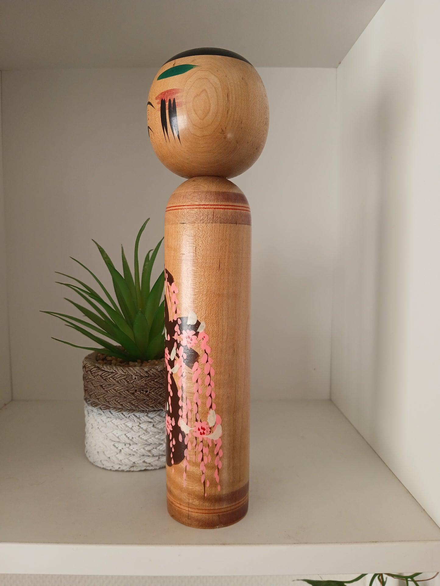 Vintage Shingata kokeshi with Wisteria design