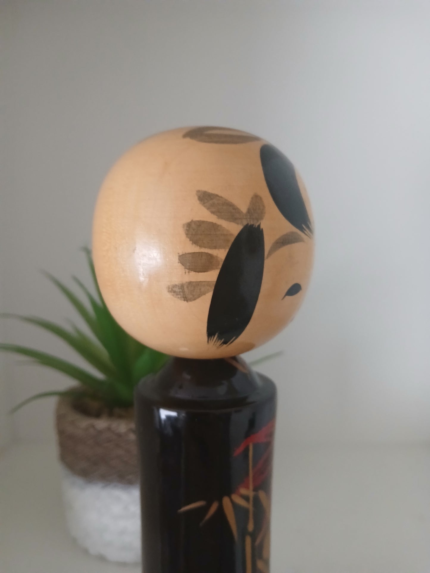 Lovely vintage black lacquer kokeshi by Takahashi Tatsuro