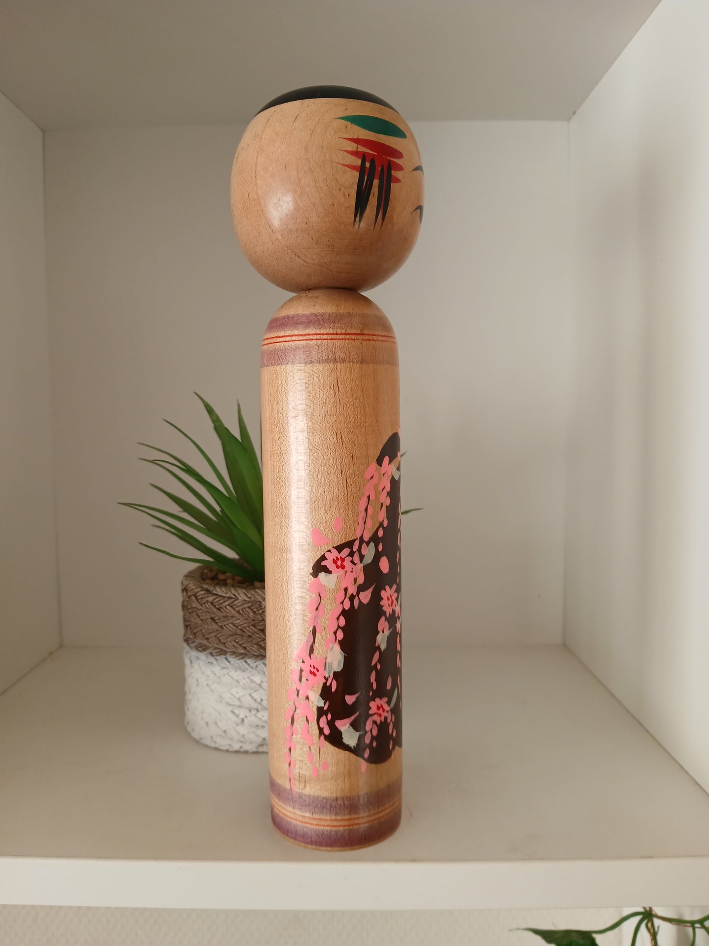 Vintage Shingata kokeshi with Wisteria design