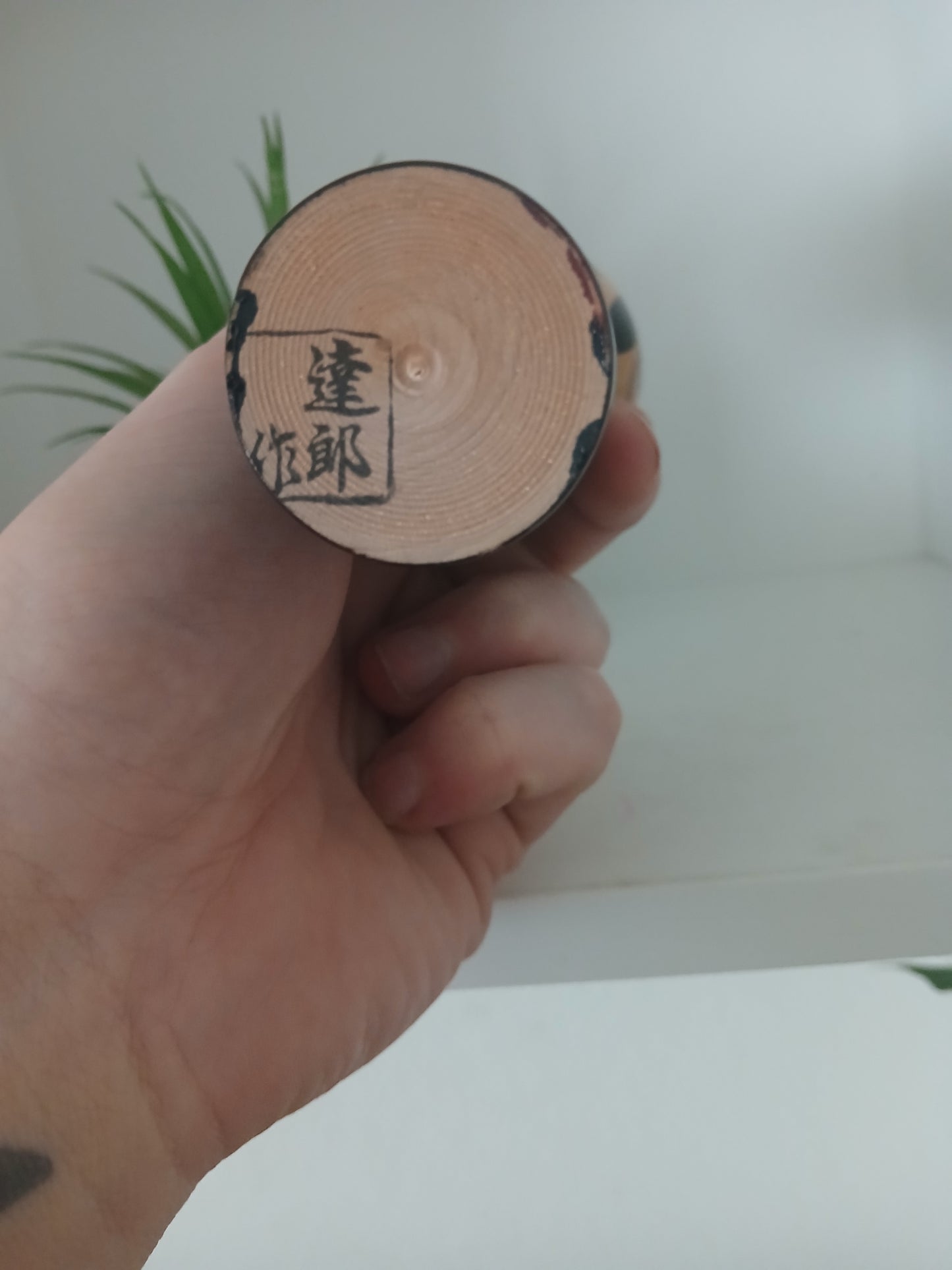 Lovely vintage black lacquer kokeshi by Takahashi Tatsuro