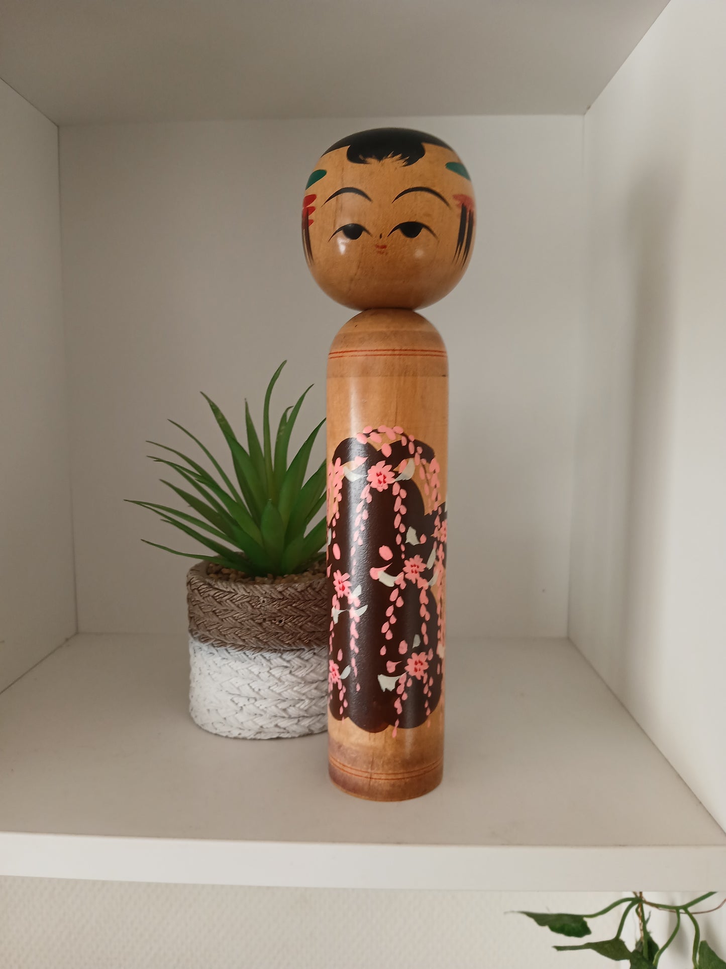 Vintage Shingata kokeshi with Wisteria design