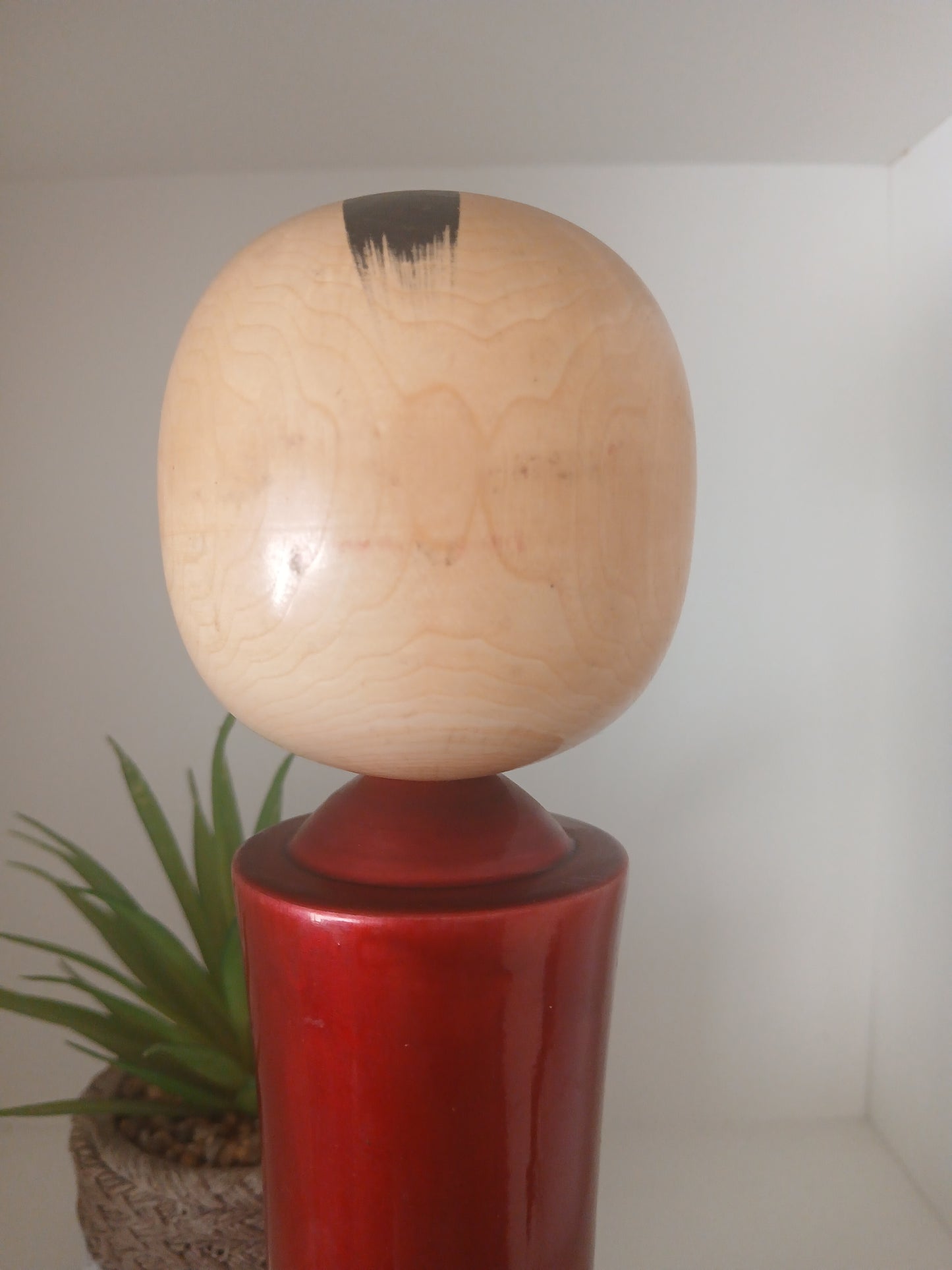 Lovely vintage red lacquer kokeshi by Takahashi Tatsuro