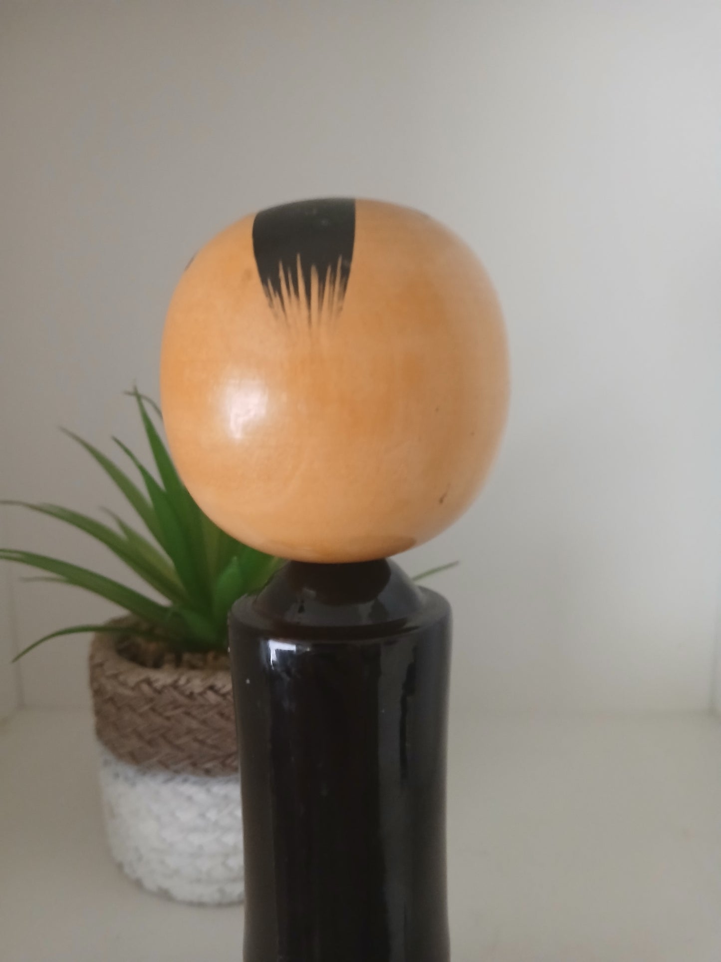 Lovely vintage black lacquer kokeshi by Takahashi Tatsuro