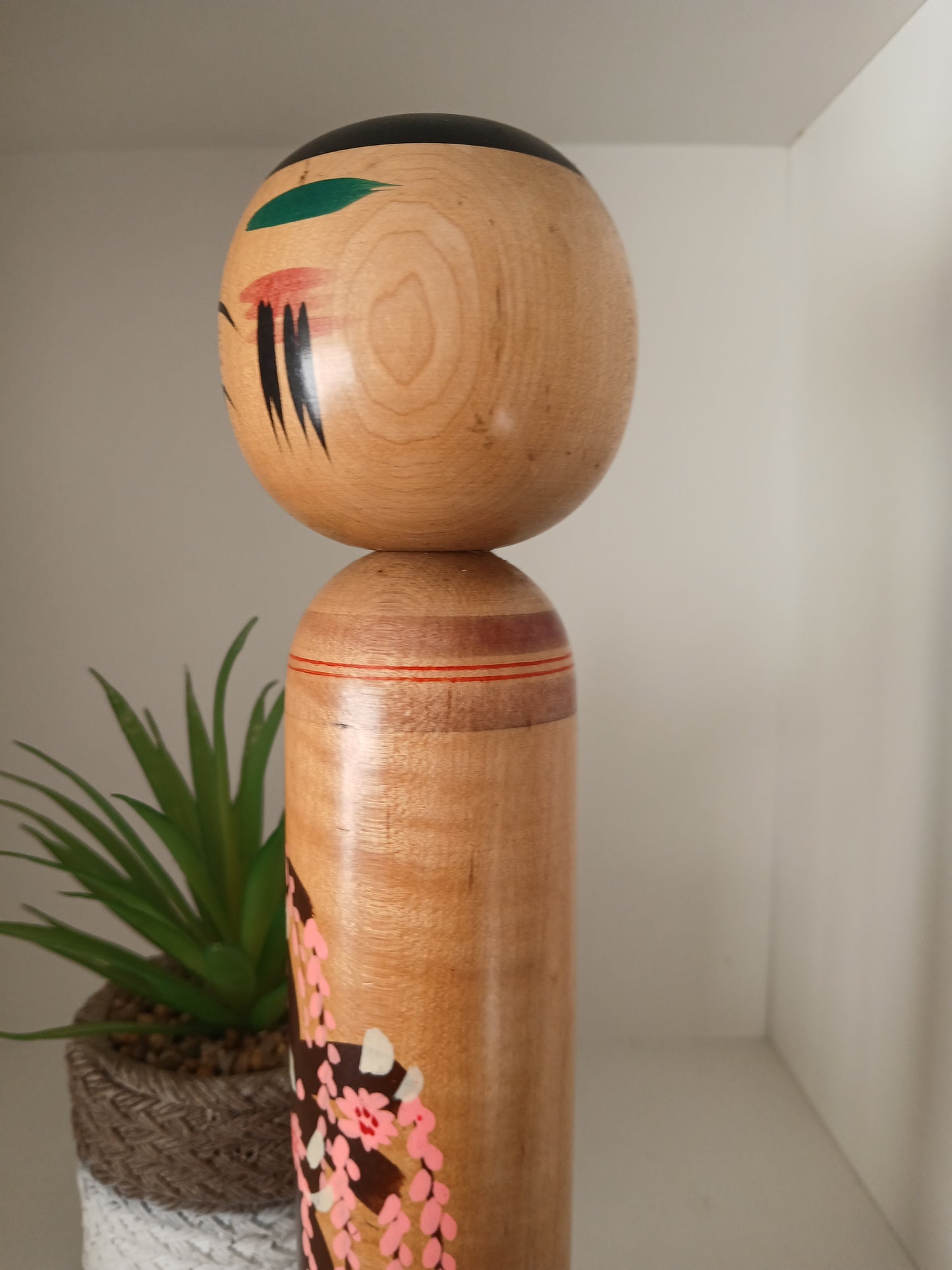 Vintage Shingata kokeshi with Wisteria design