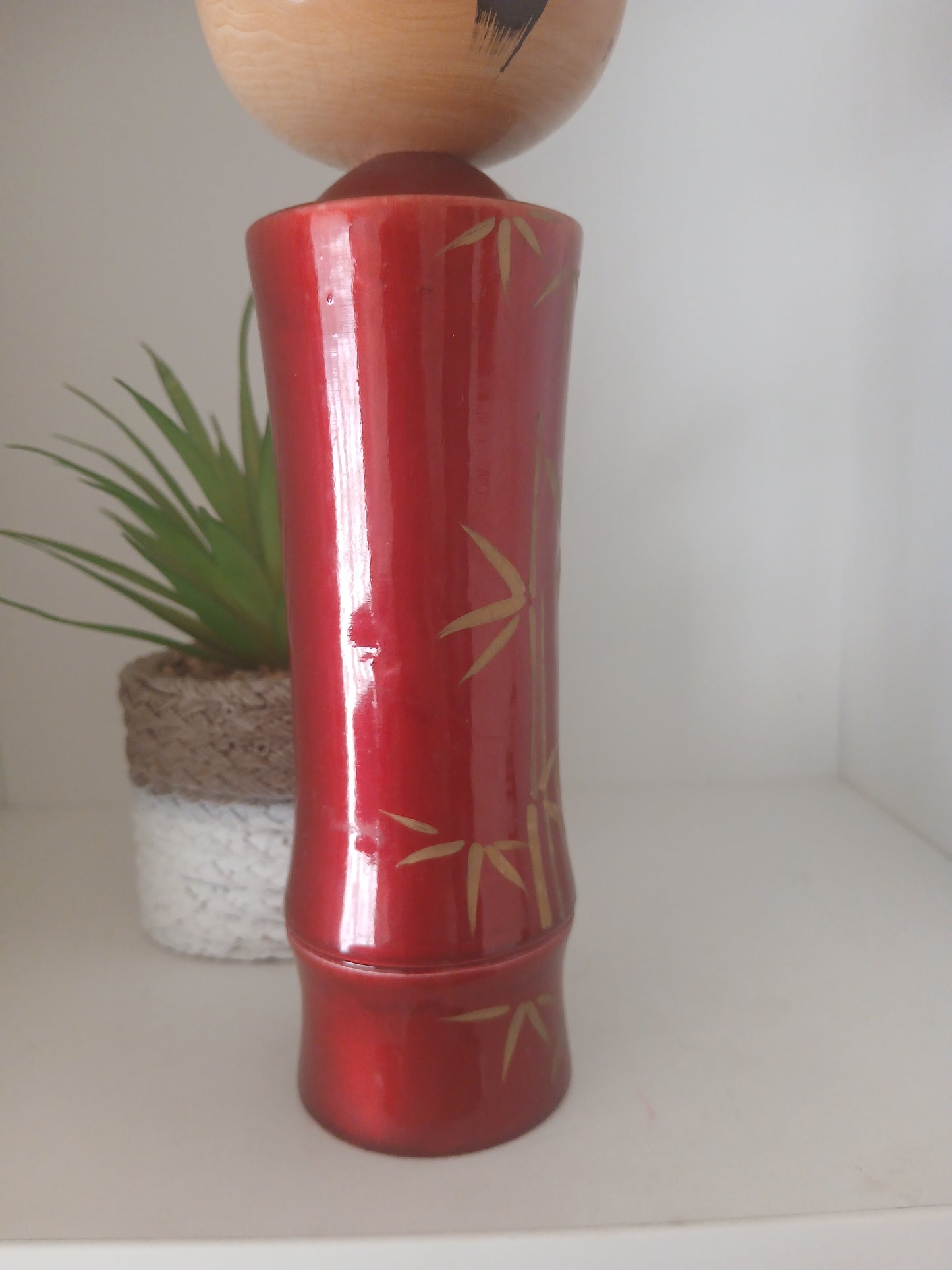 Lovely vintage red lacquer kokeshi by Takahashi Tatsuro