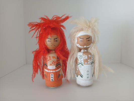 Two vintage kokeshi by Yuukari Kougei