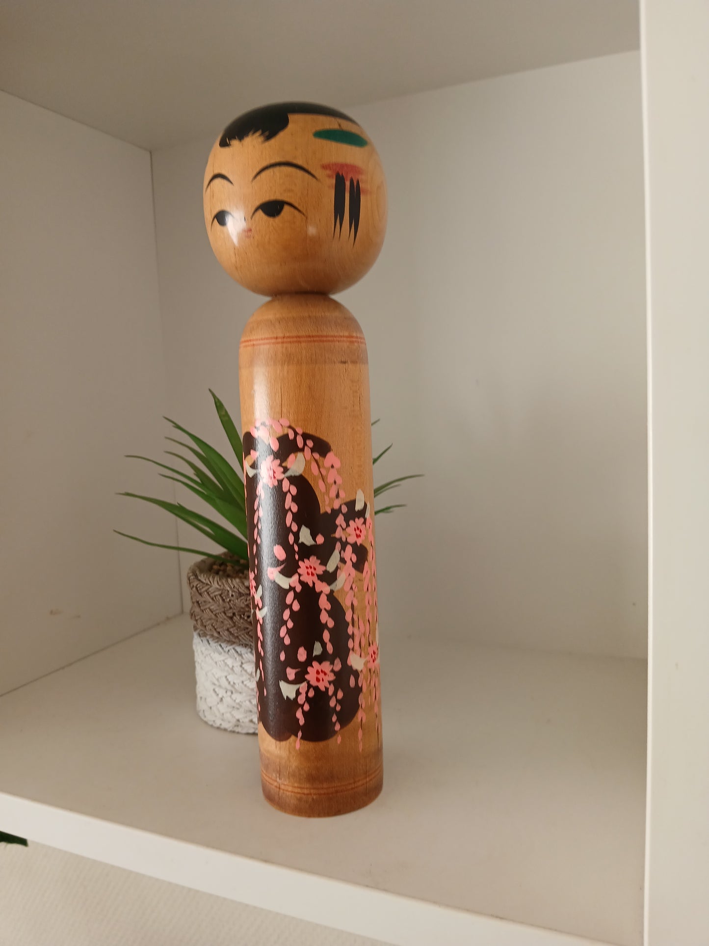 Vintage Shingata kokeshi with Wisteria design