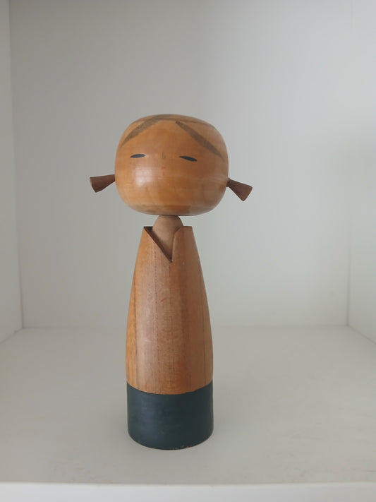Cute vintage kokeshi with pigtails