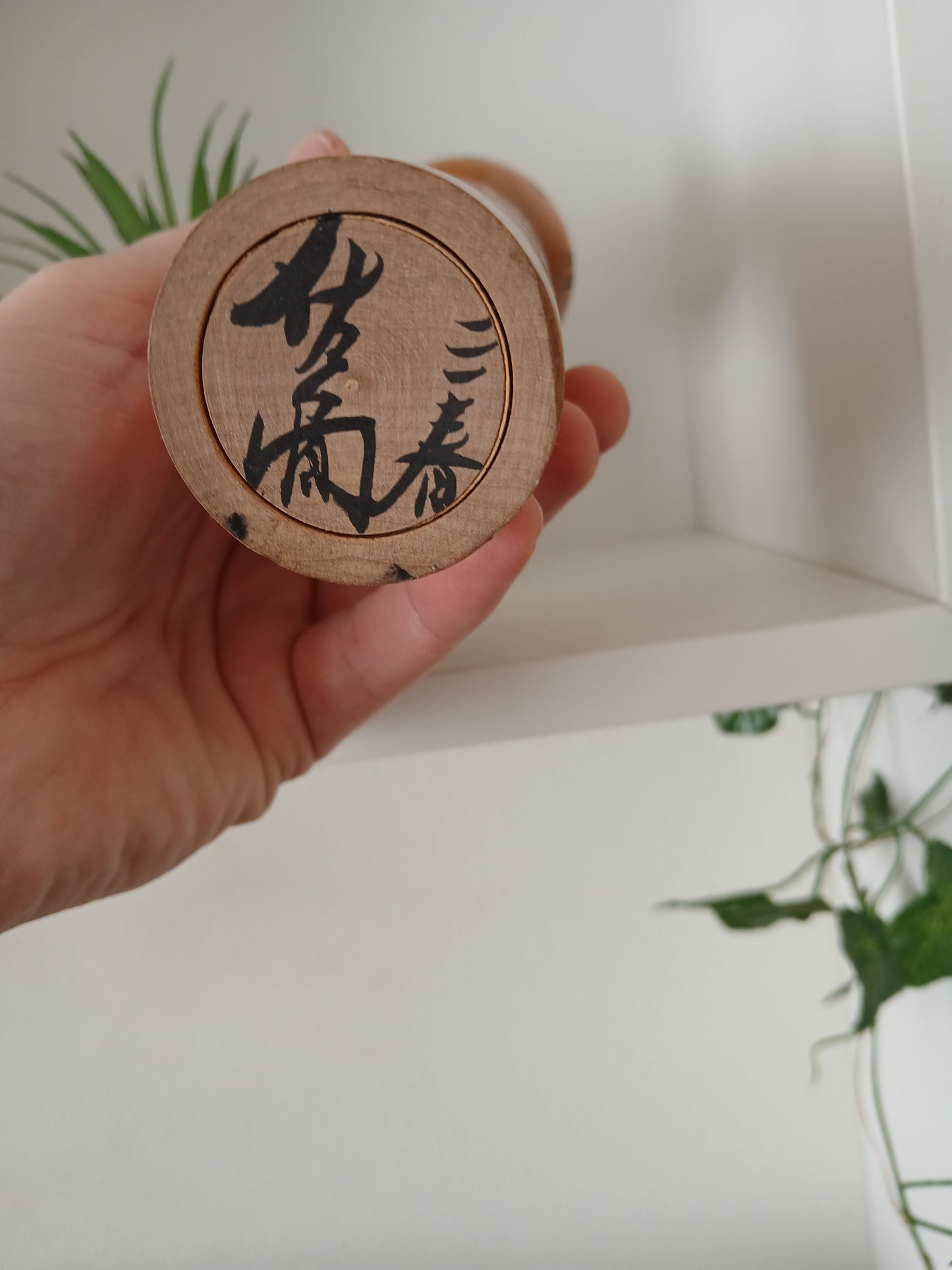 Vintage Shingata kokeshi with Wisteria design