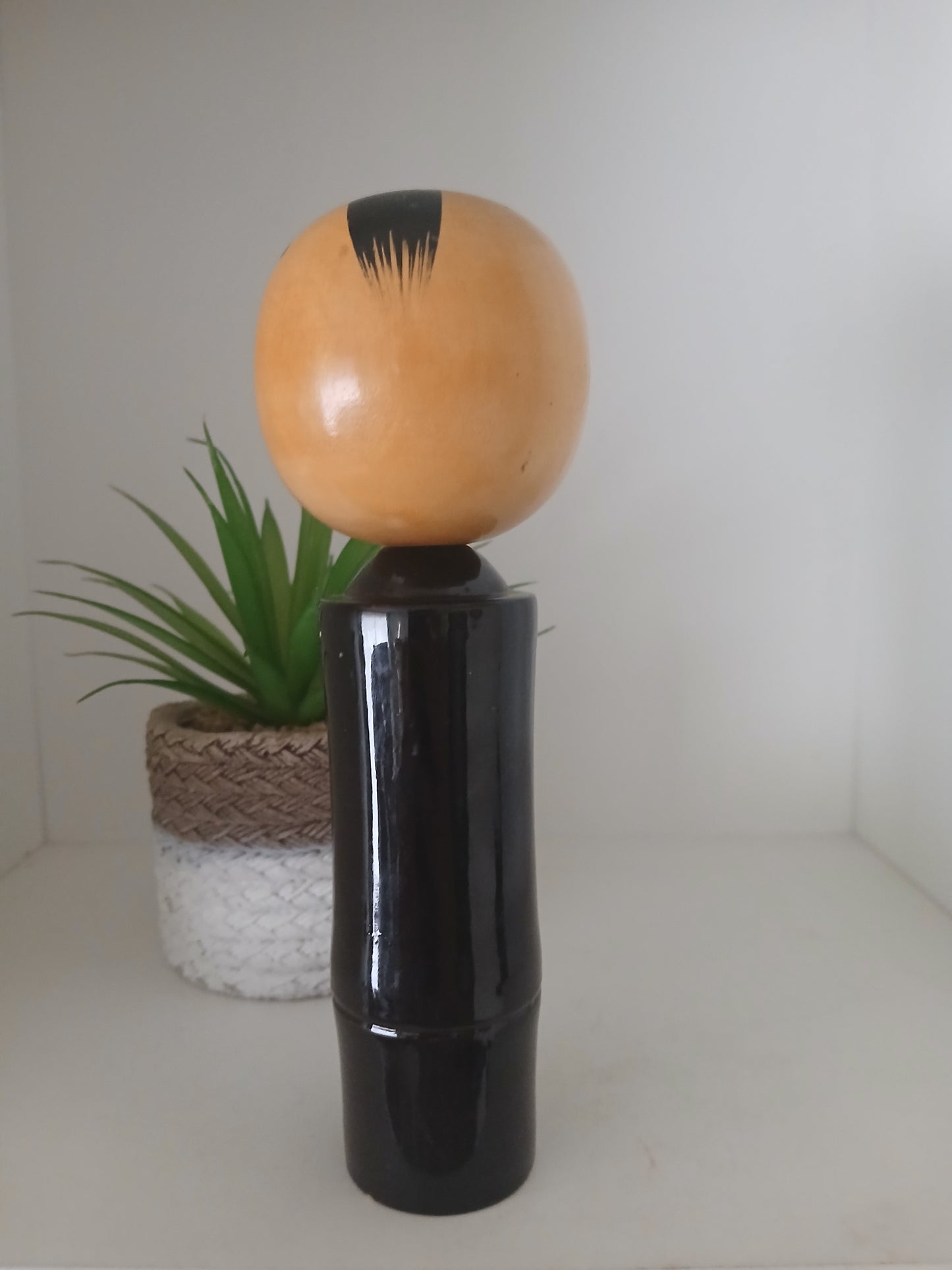 Lovely vintage black lacquer kokeshi by Takahashi Tatsuro