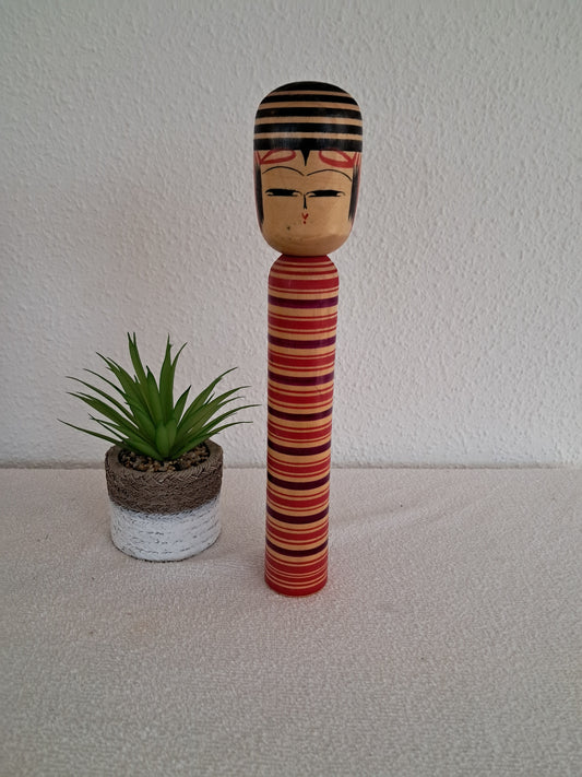 Traditional kokeshi by Jiryo Kobo atelier.